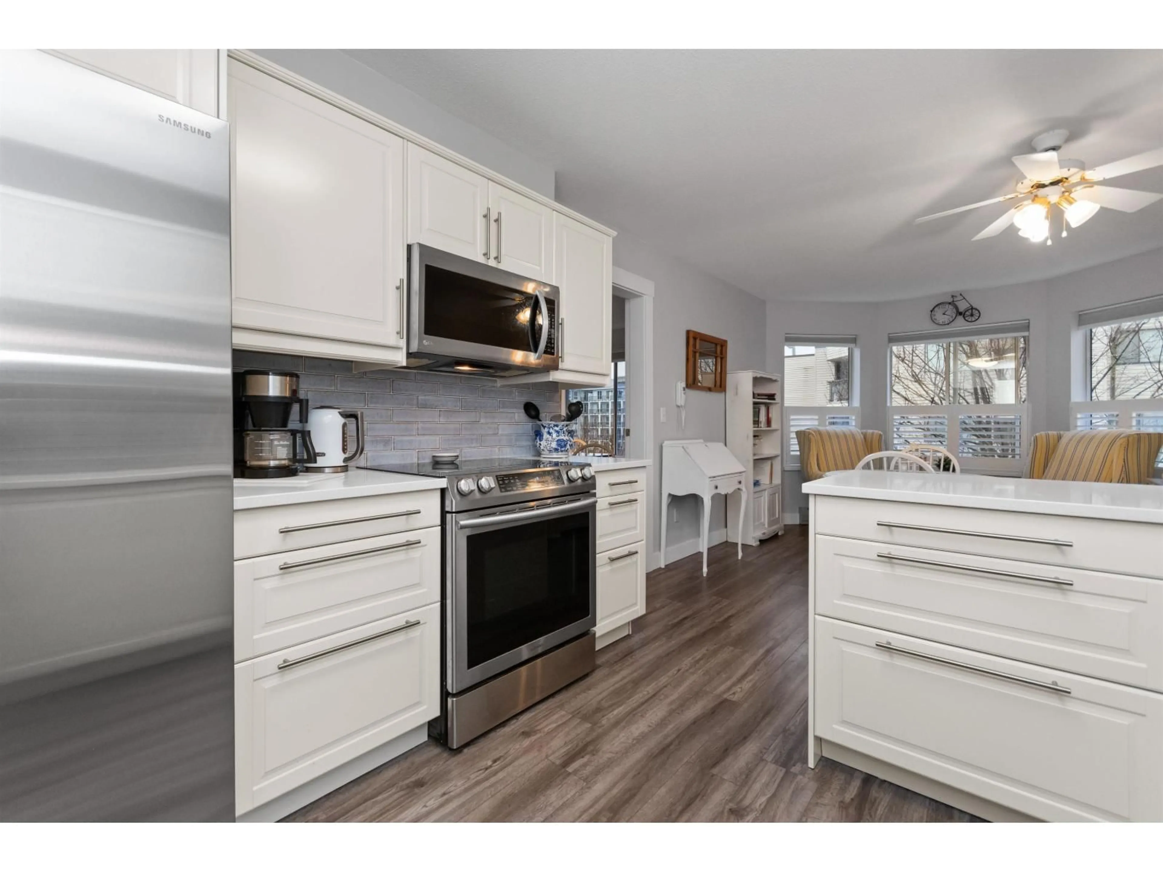 Open concept kitchen, unknown for 209 - 2491 GLADWIN ROAD, Abbotsford British Columbia V2T3N8