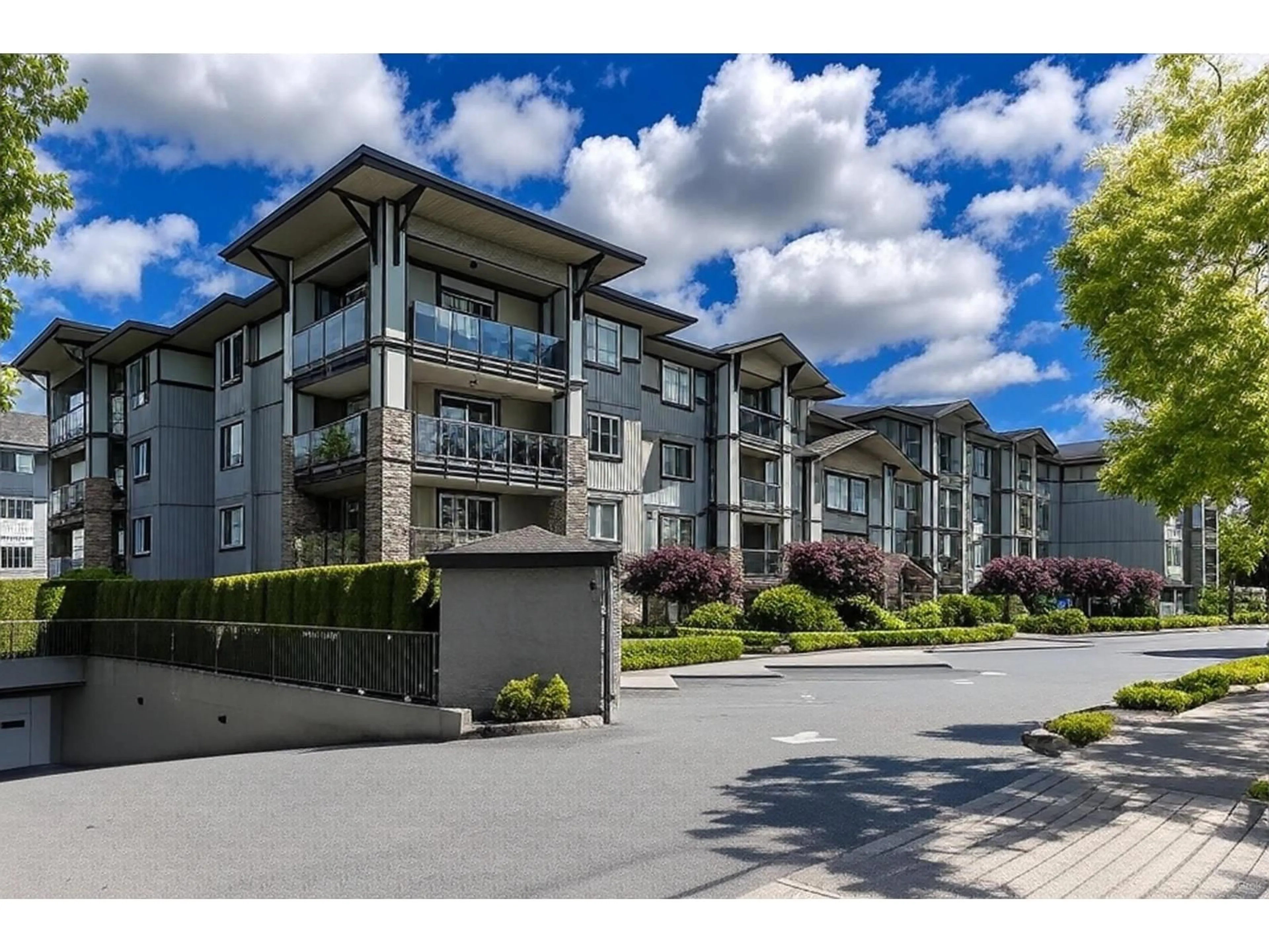 A pic from outside/outdoor area/front of a property/back of a property/a pic from drone, street for 104 - 2038 SANDALWOOD CRESCENT, Abbotsford British Columbia V2S3H6