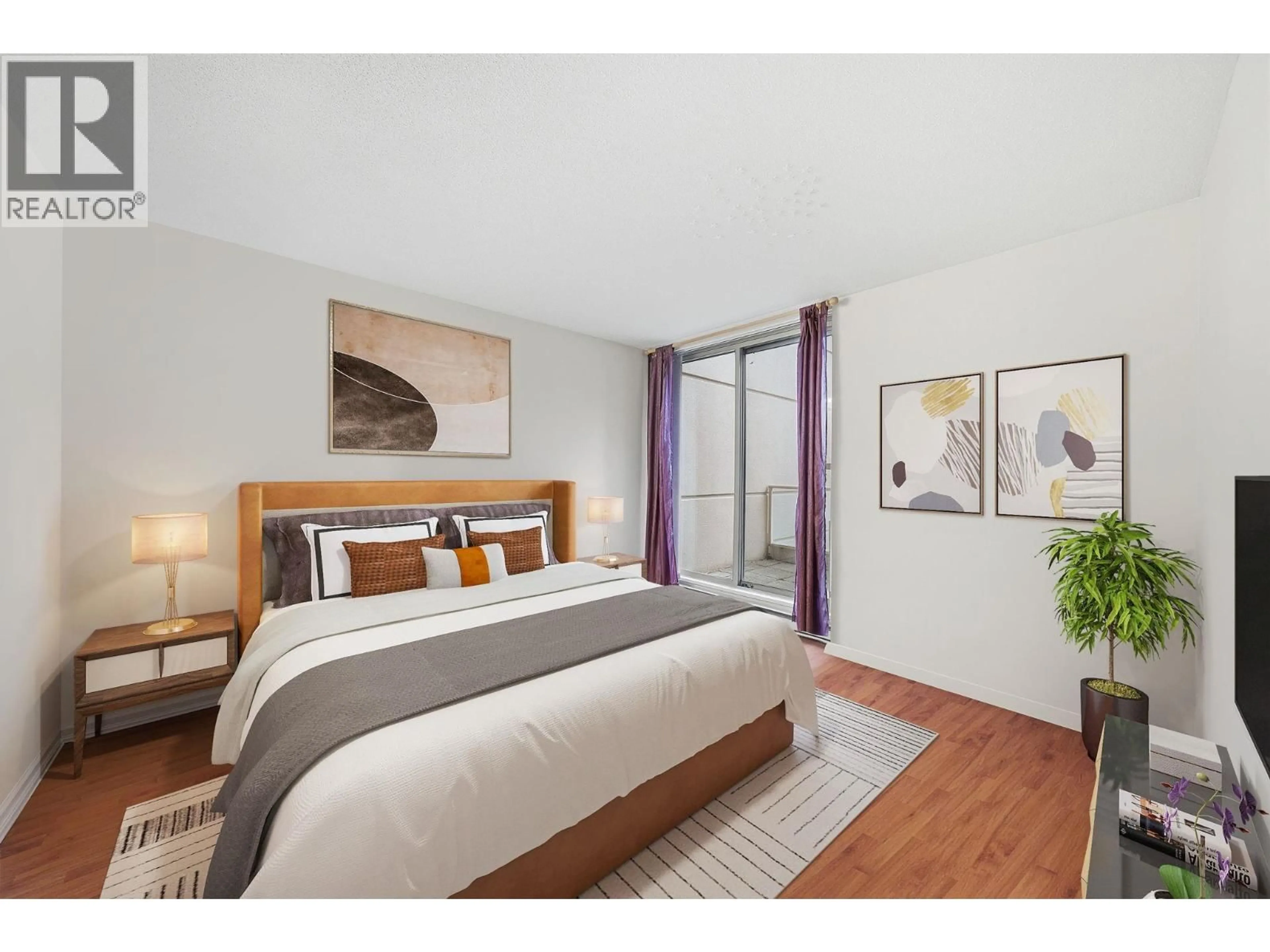 Bedroom with bed, wood/laminate floor for 201 - 8171 SABA ROAD, Richmond British Columbia V6Y4B3