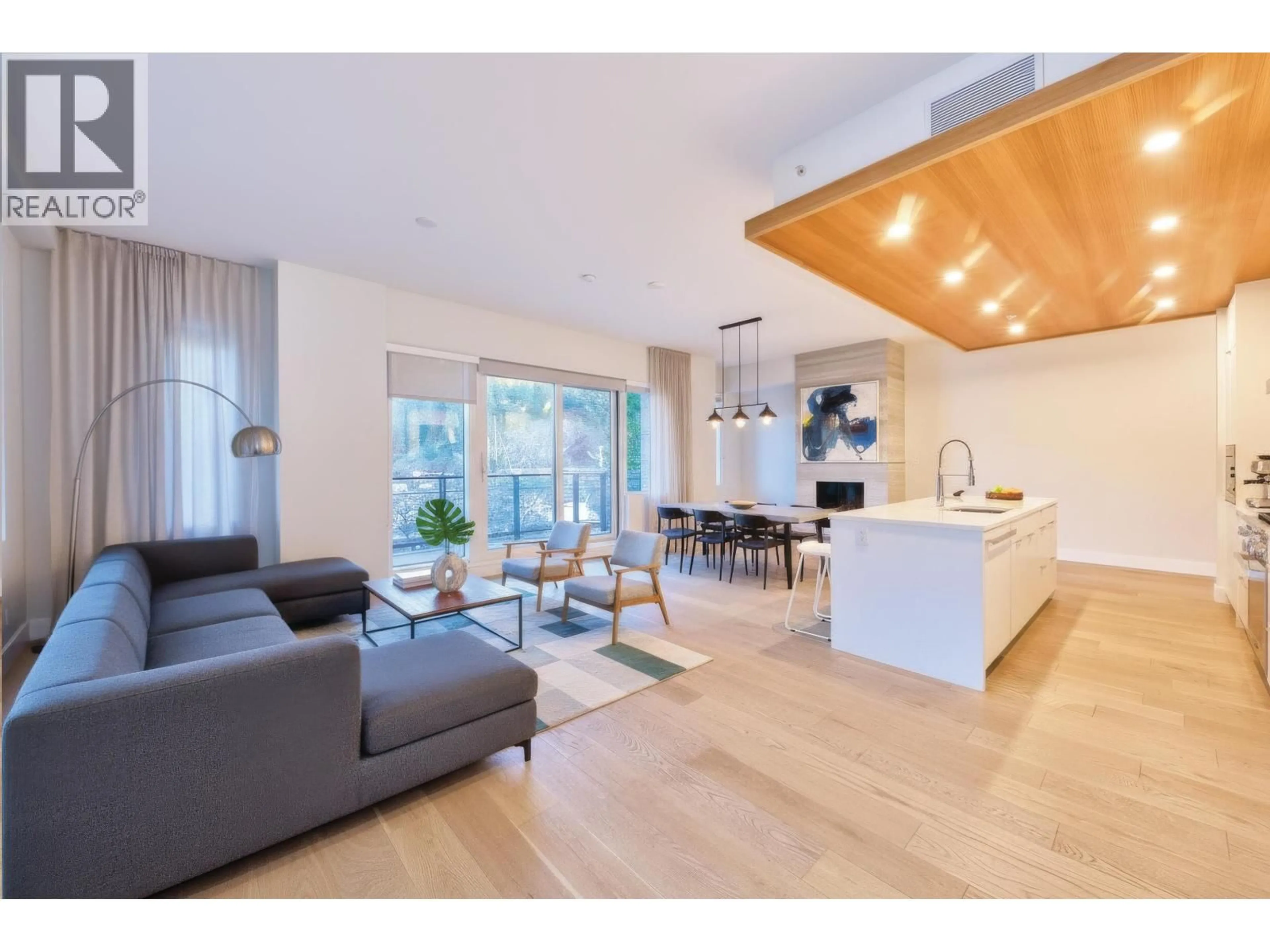 Open concept kitchen, wood/laminate floor for 201 - 6707 NELSON AVENUE, West Vancouver British Columbia V7W0A4