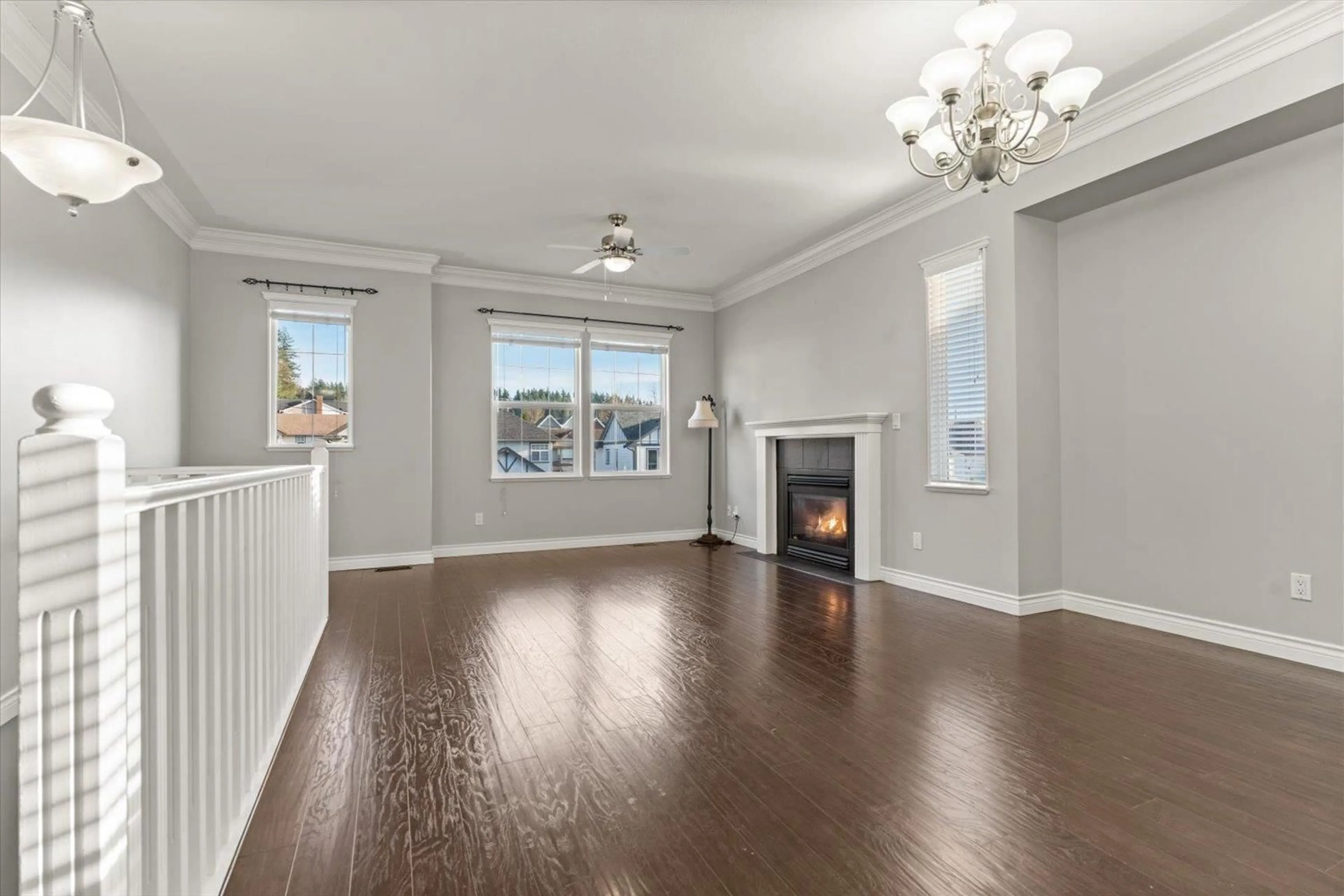 Living room with furniture, wood/laminate floor for 8263 MELBURN DRIVE, Mission British Columbia V2V7H3