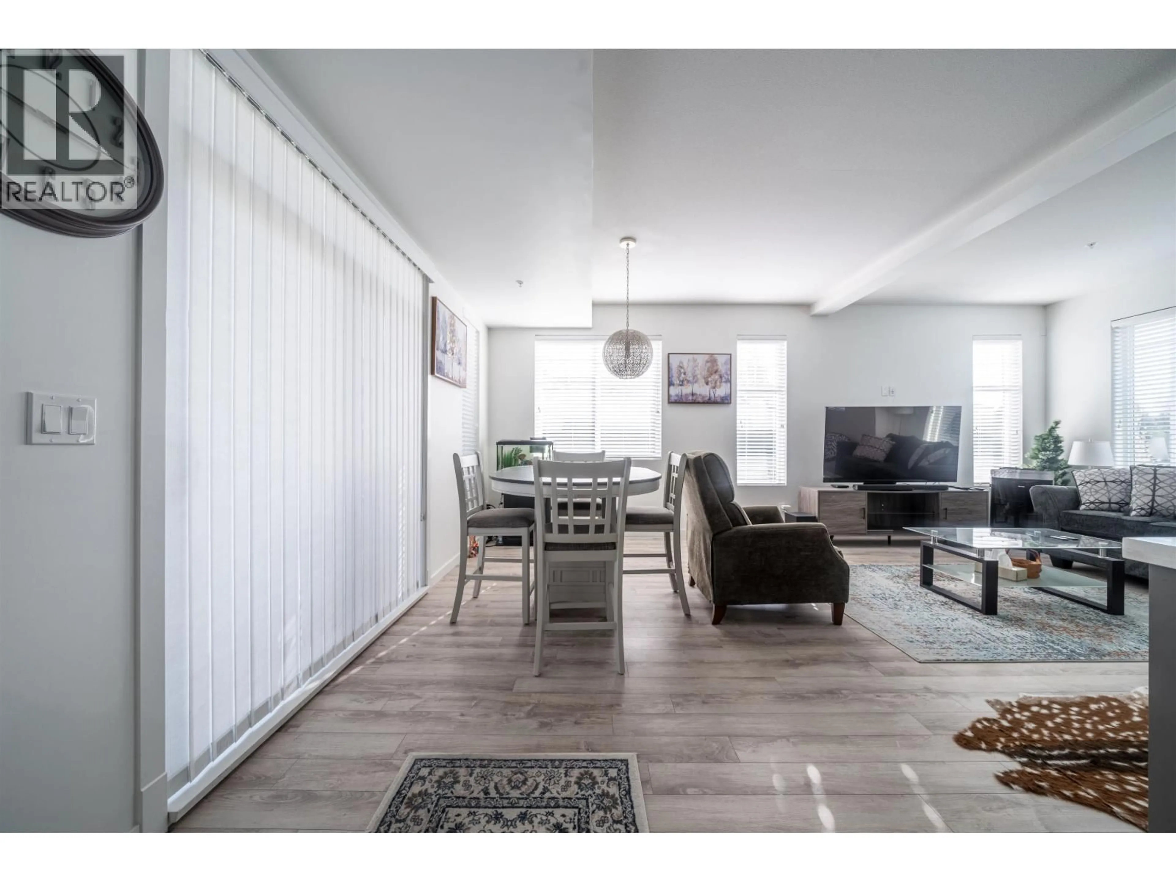 Living room with furniture, wood/laminate floor for 37 - 11272 240 STREET, Maple Ridge British Columbia V2W0J8