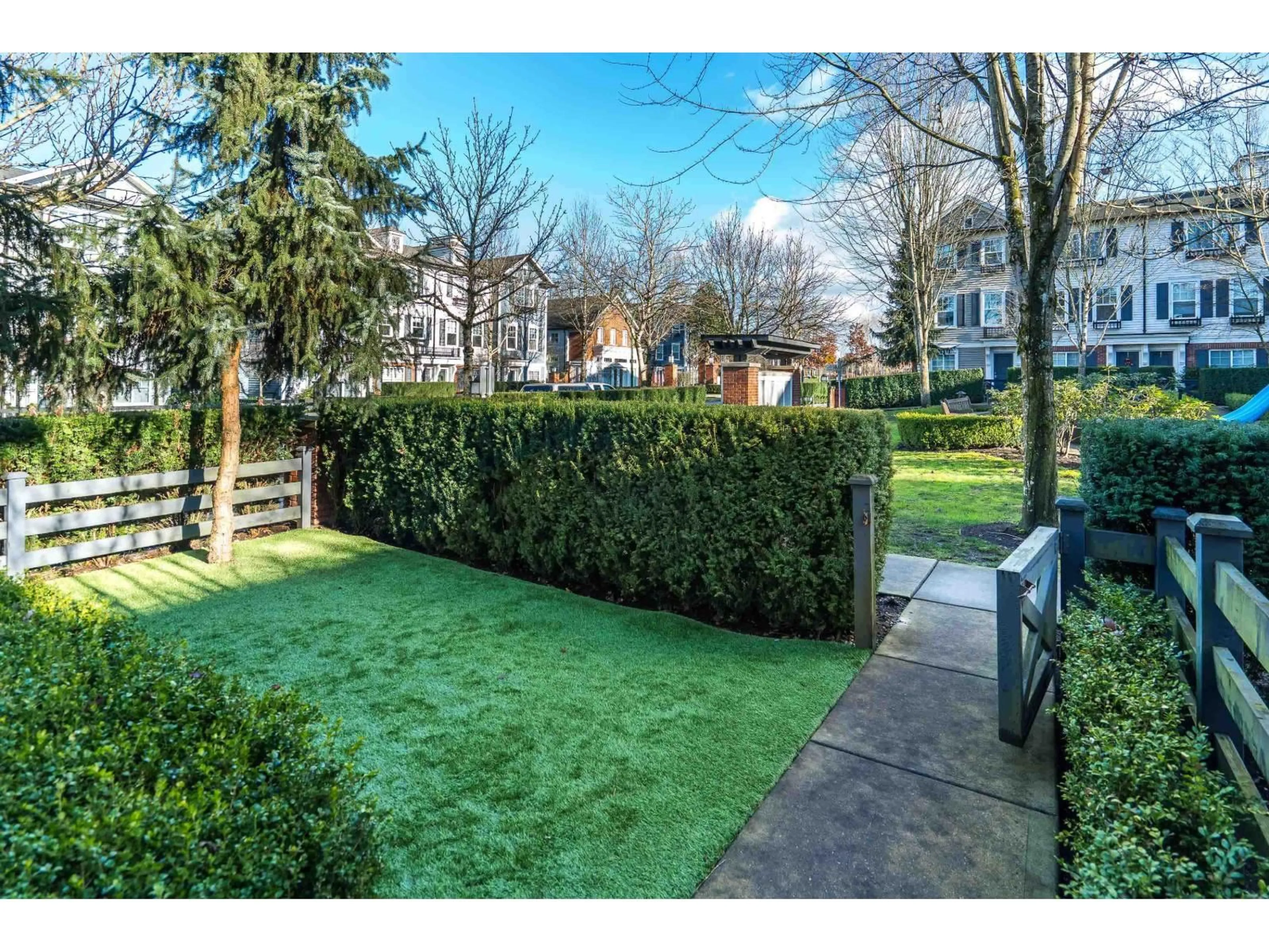 A pic from outside/outdoor area/front of a property/back of a property/a pic from drone, street for 45 - 7238 189 STREET STREET, Surrey British Columbia V4N5Y6