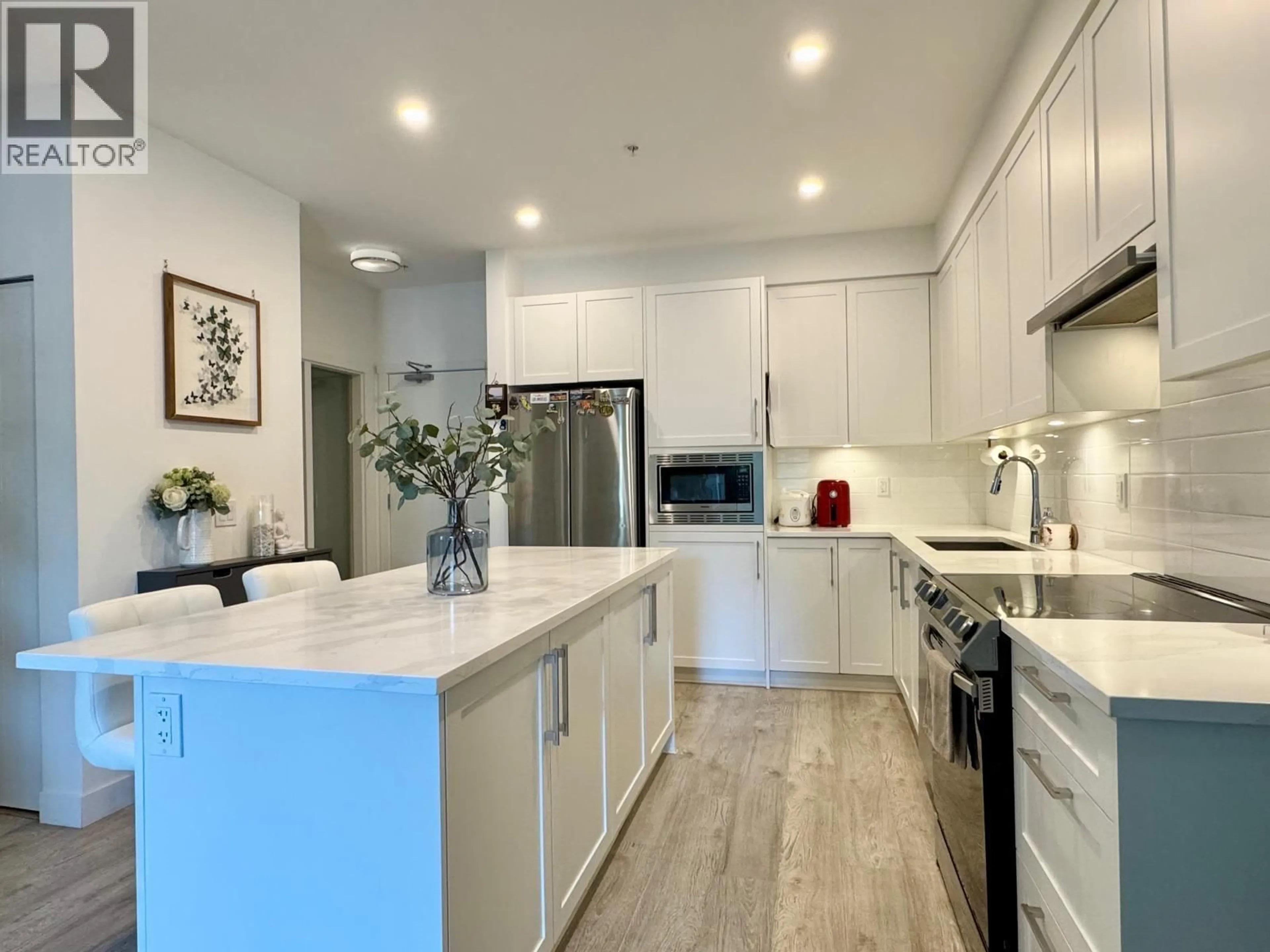 Open concept kitchen, ceramic/tile floor for 208 - 2160 GRANT AVENUE, Port Coquitlam British Columbia V3B0T3