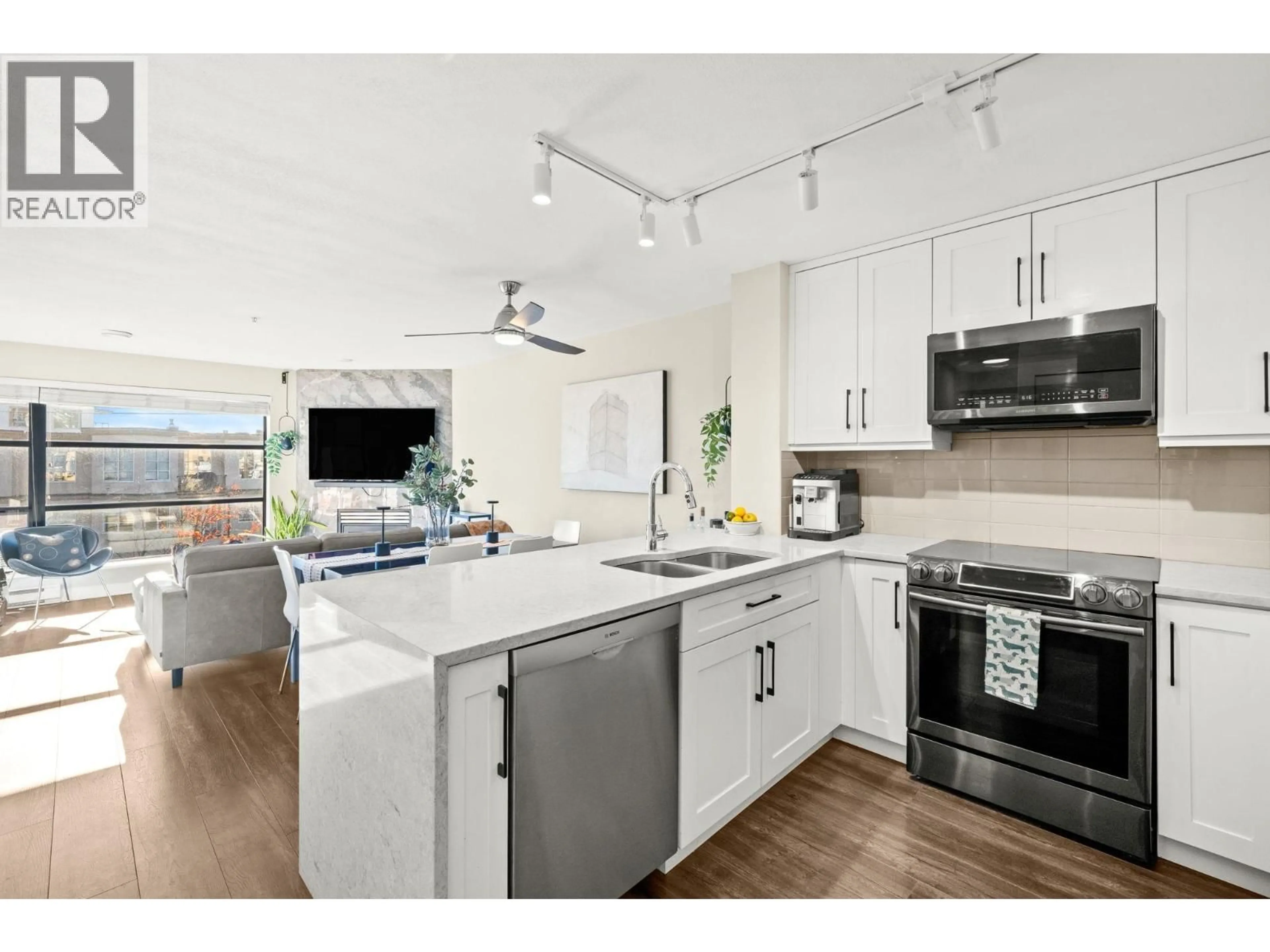 Open concept kitchen, unknown for 410 - 124 3RD STREET, North Vancouver British Columbia V7M1E8