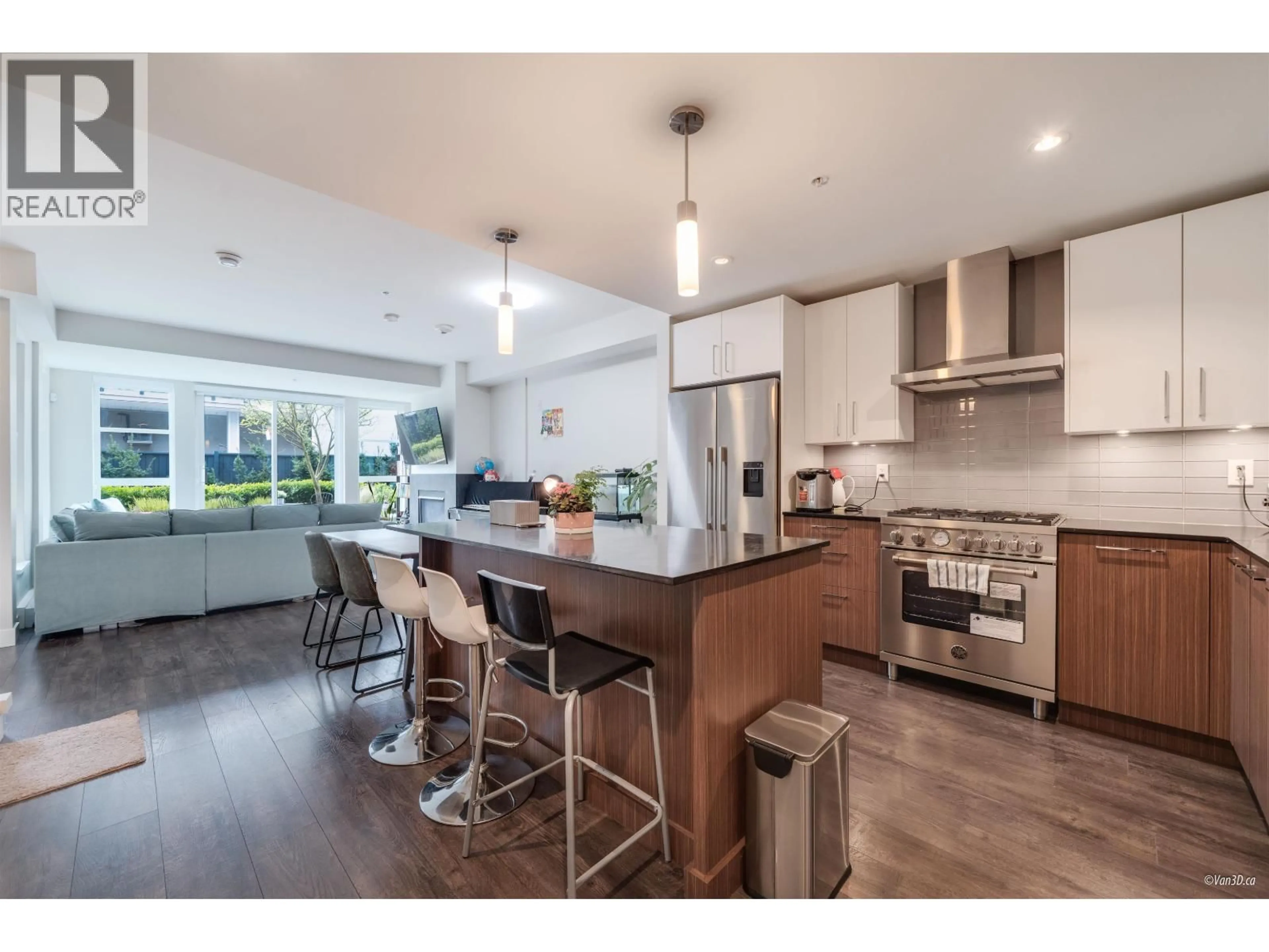 Open concept kitchen, wood/laminate floor for 18 - 13040 NO. 2 ROAD, Richmond British Columbia V7E0C4