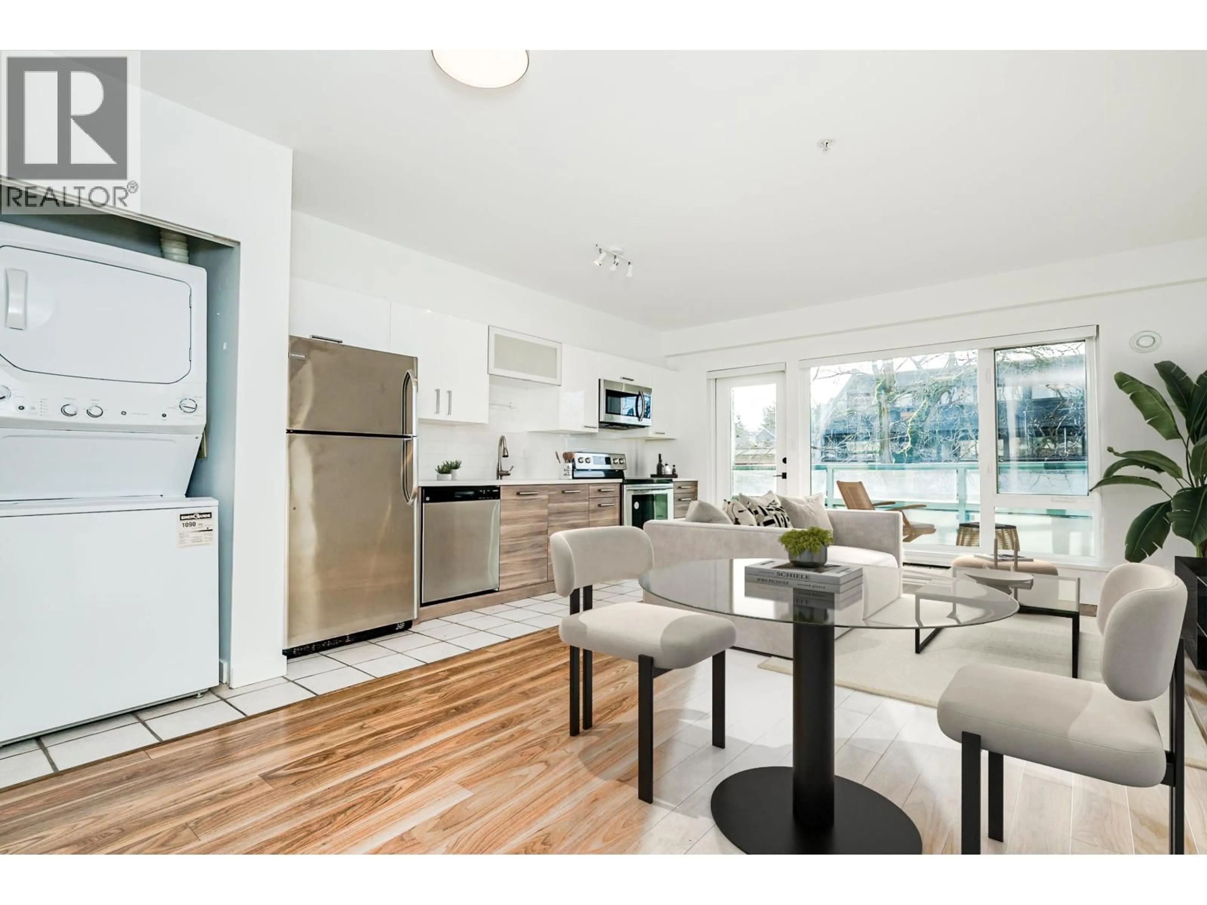 Open concept kitchen, wood/laminate floor for 206 - 1688 CYPRESS STREET, Vancouver British Columbia V6J5J1