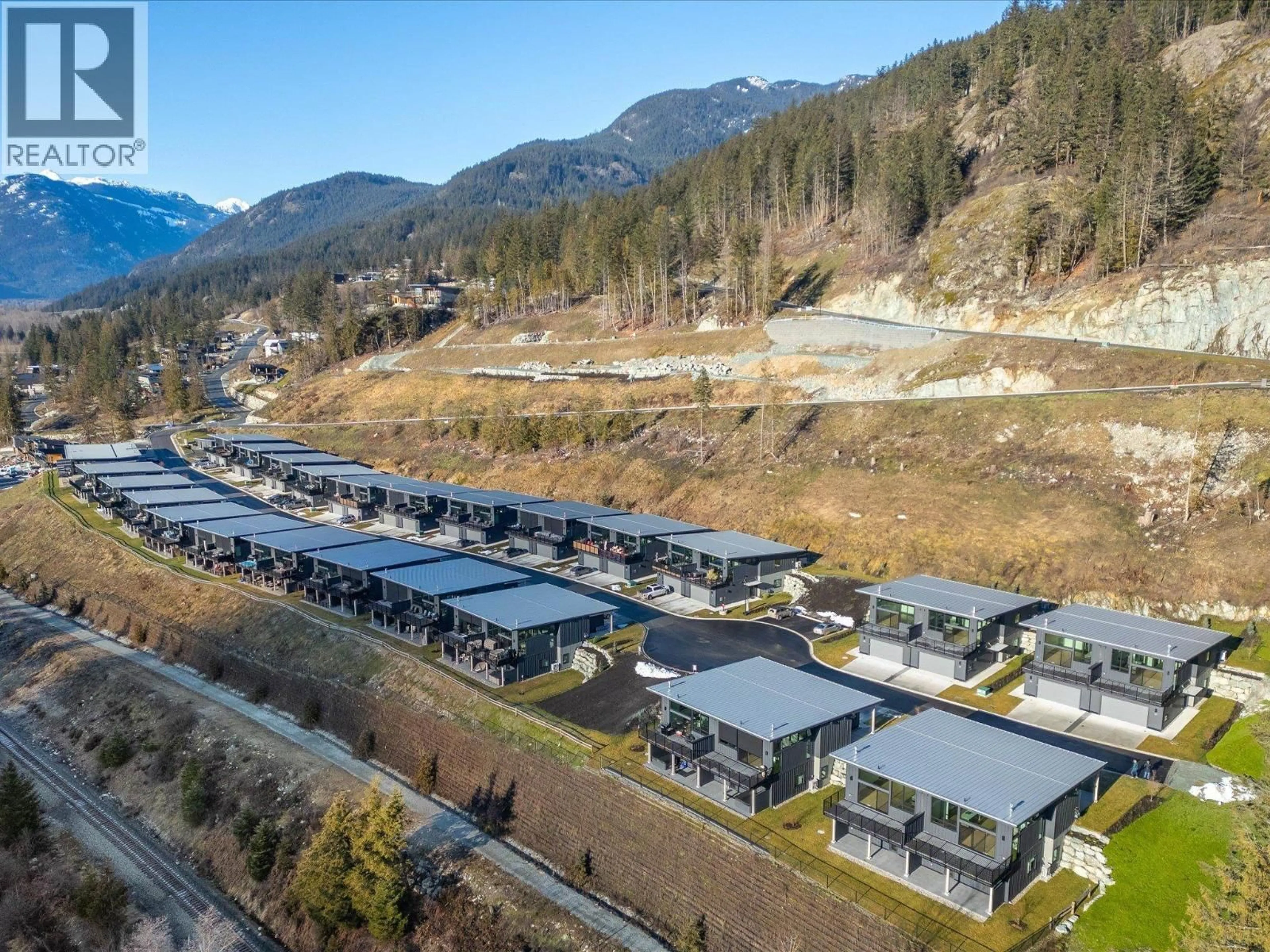 A pic from outside/outdoor area/front of a property/back of a property/a pic from drone, mountain view for 28 - 4000 SUNSTONE WAY, Pemberton British Columbia V0N2L3