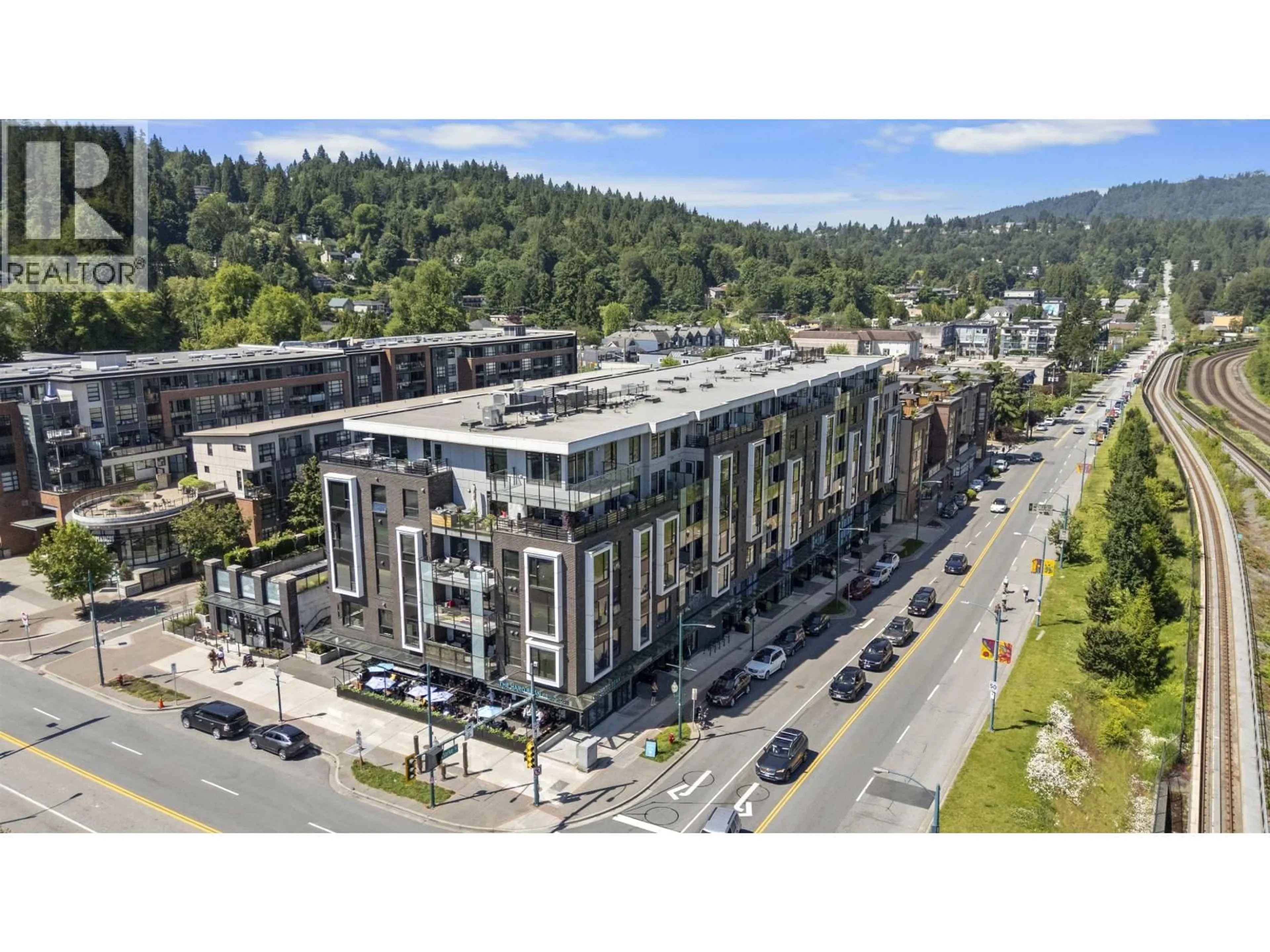 A pic from outside/outdoor area/front of a property/back of a property/a pic from drone, mountain view for 411 - 83 MOODY STREET, Port Moody British Columbia V3H0K7