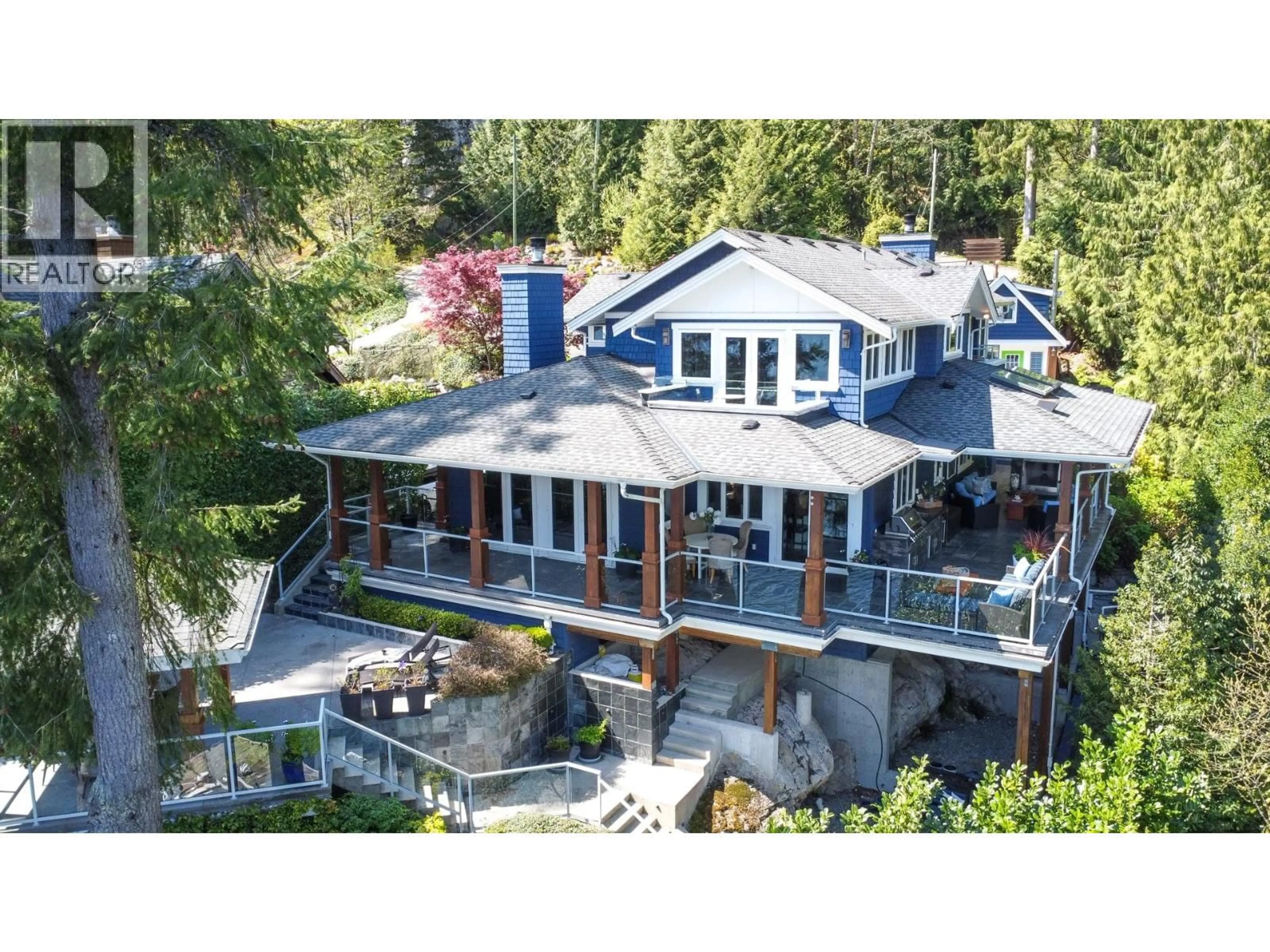 A pic from outside/outdoor area/front of a property/back of a property/a pic from drone, water/lake/river/ocean view for 5125 INDIAN RIVER DRIVE, North Vancouver British Columbia V7G2T6