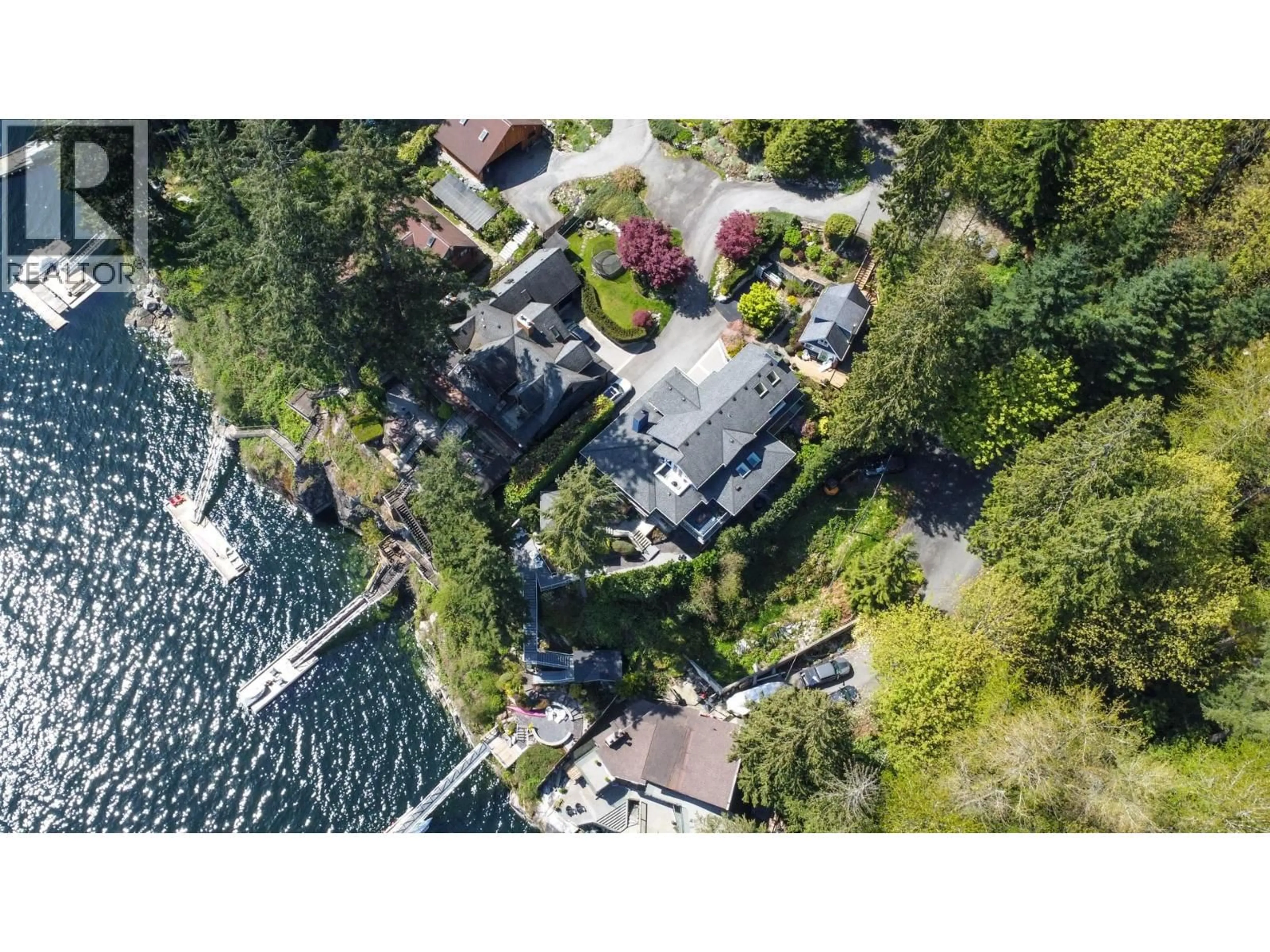 A pic from outside/outdoor area/front of a property/back of a property/a pic from drone, water/lake/river/ocean view for 5125 INDIAN RIVER DRIVE, North Vancouver British Columbia V7G2T6