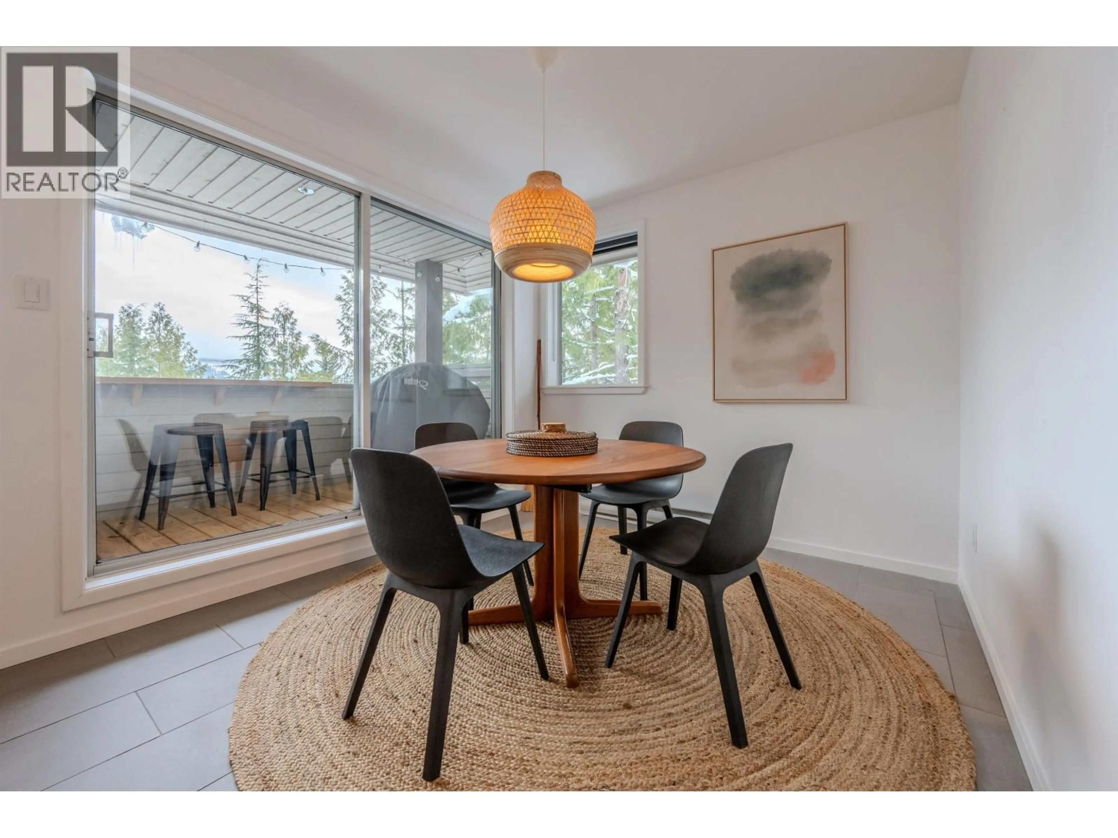 Dining room, wood/laminate floor for 14 - 2240 GONDOLA WAY, Whistler British Columbia V8E0N1