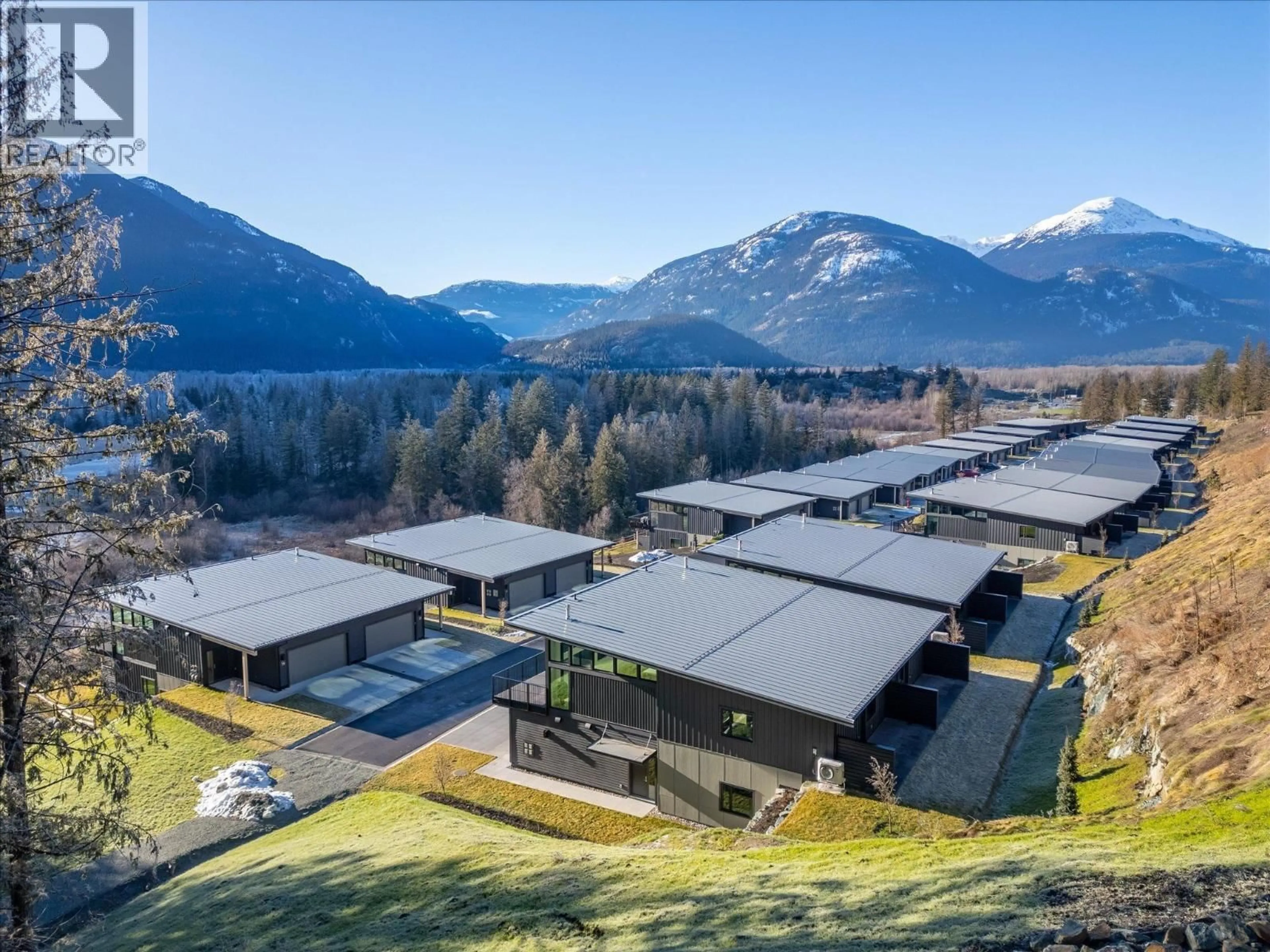 A pic from outside/outdoor area/front of a property/back of a property/a pic from drone, mountain view for 30 - 4000 SUNSTONE WAY, Pemberton British Columbia V0N2L3