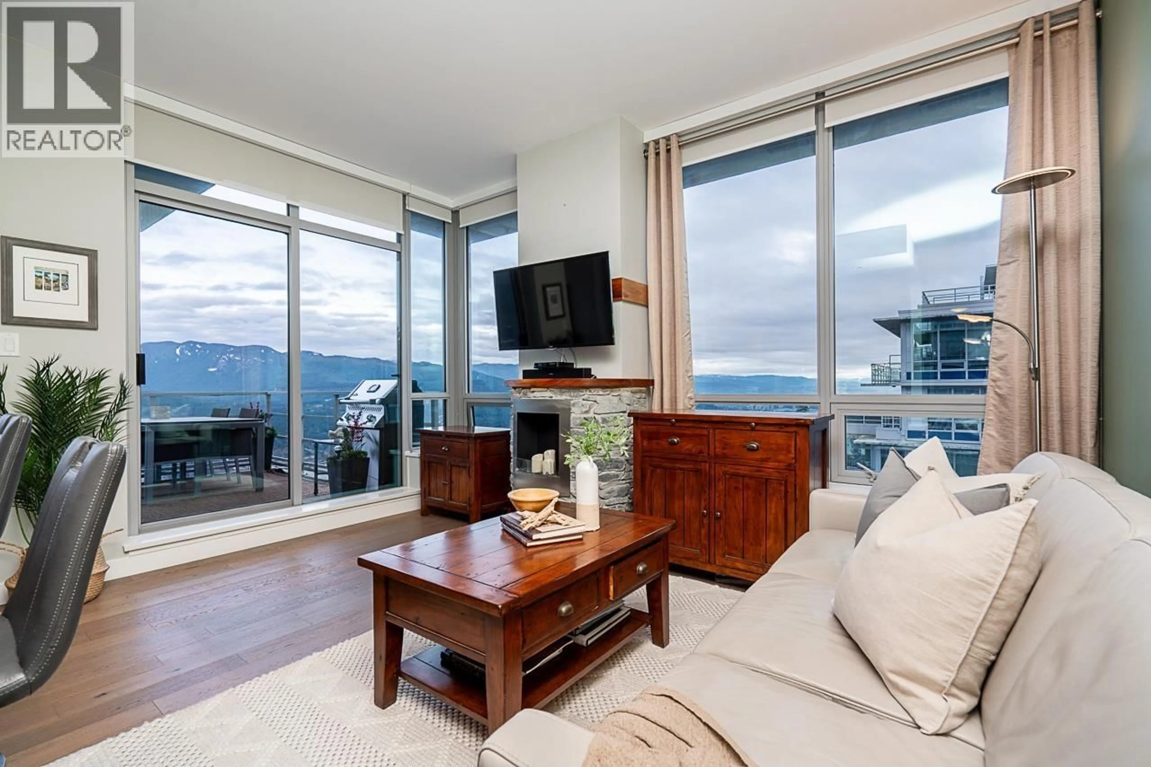 Living room with furniture, unknown for 1506 - 9060 UNIVERSITY CRESCENT, Burnaby British Columbia V5A0E1