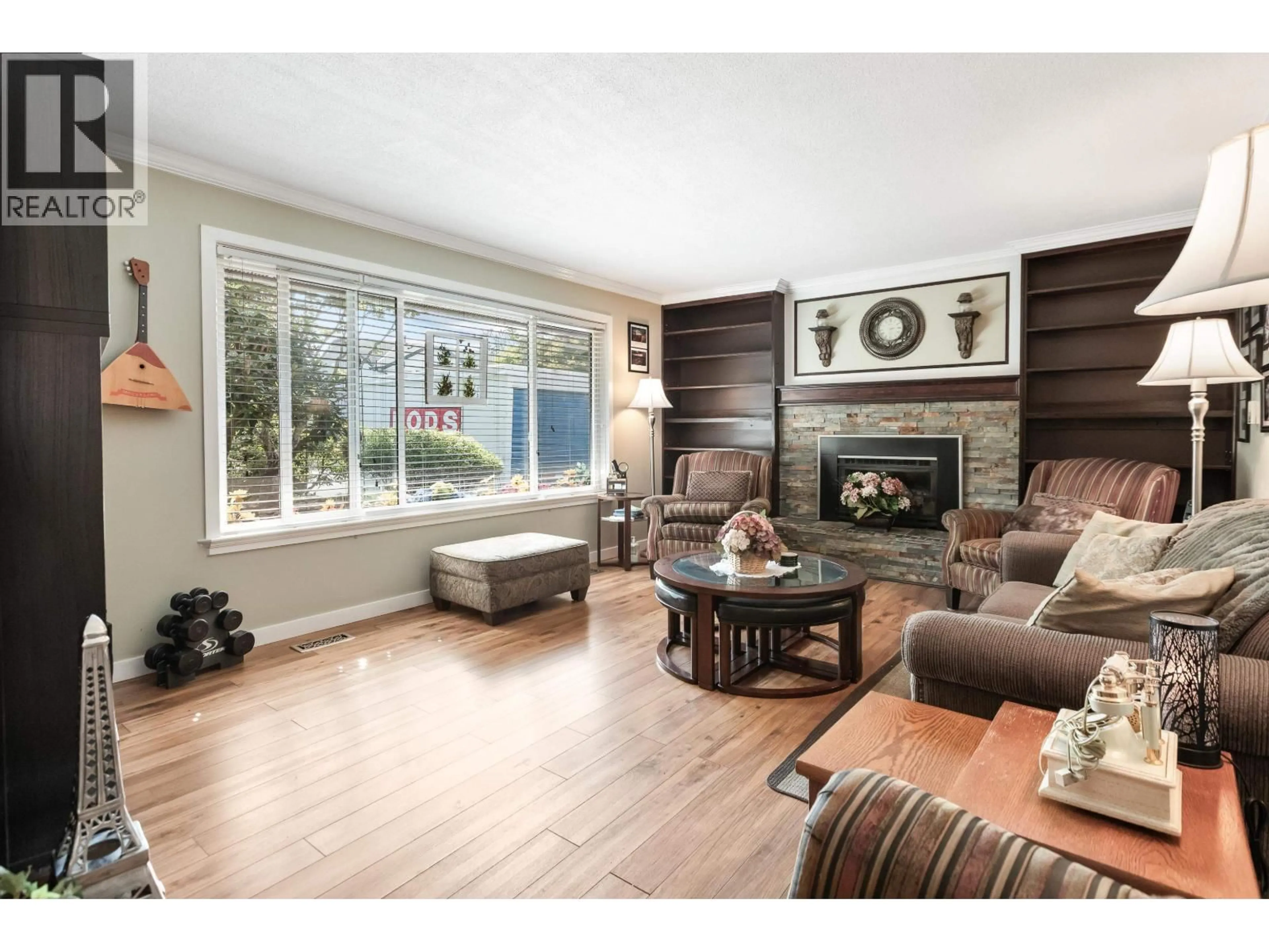 Living room with furniture, wood/laminate floor for 22991 126 AVENUE, Maple Ridge British Columbia V2X0S7