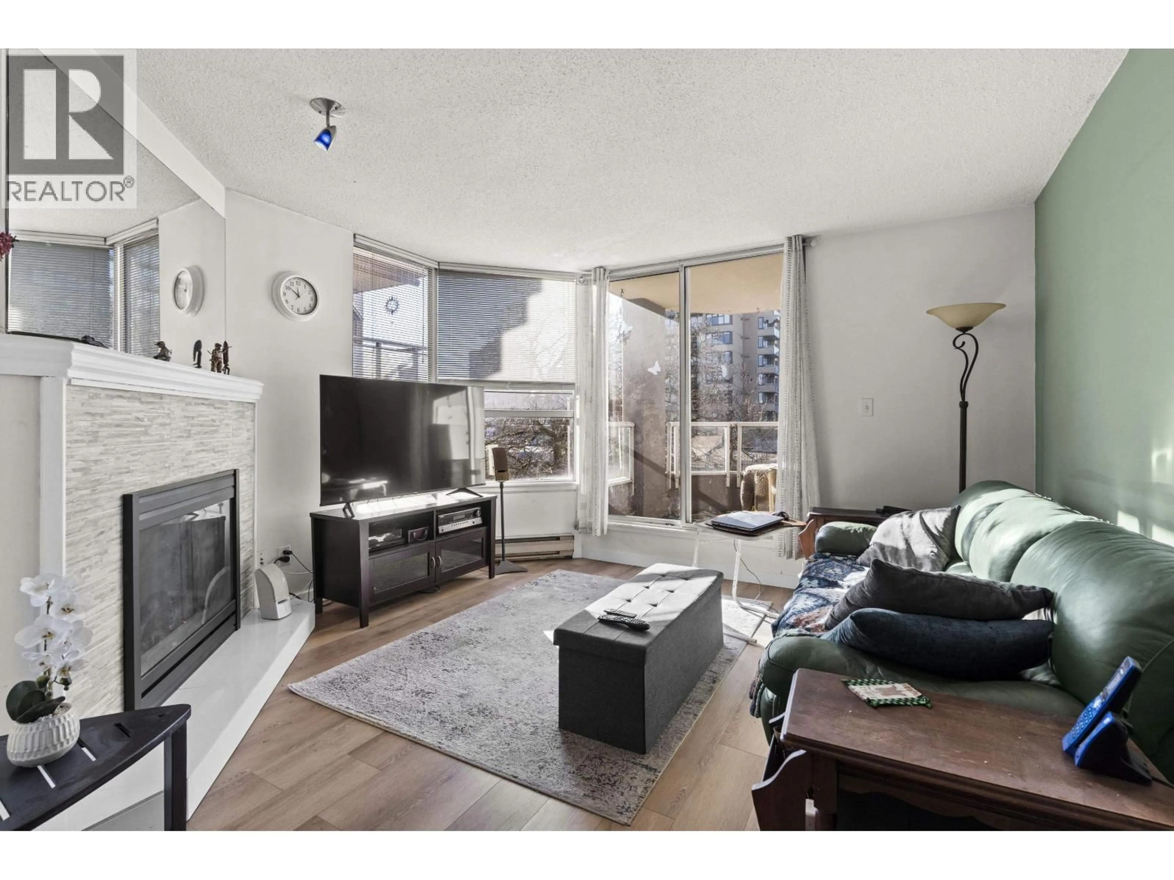 Living room with furniture, wood/laminate floor for 503 - 1771 NELSON STREET, Vancouver British Columbia V6G1M6