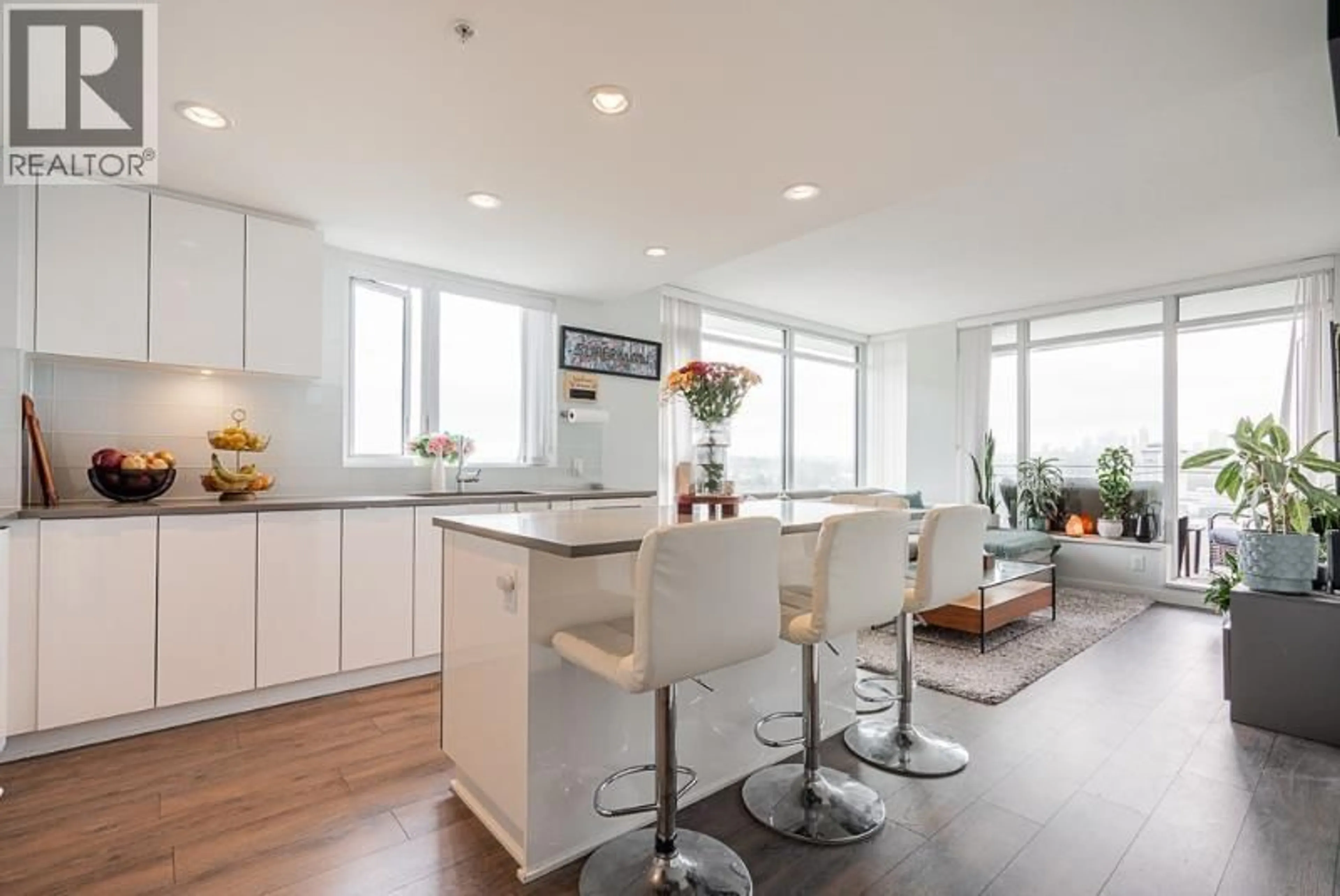 Open concept kitchen, wood/laminate floor for 1601 - 2388 MADISON AVENUE, Burnaby British Columbia V5C0K8