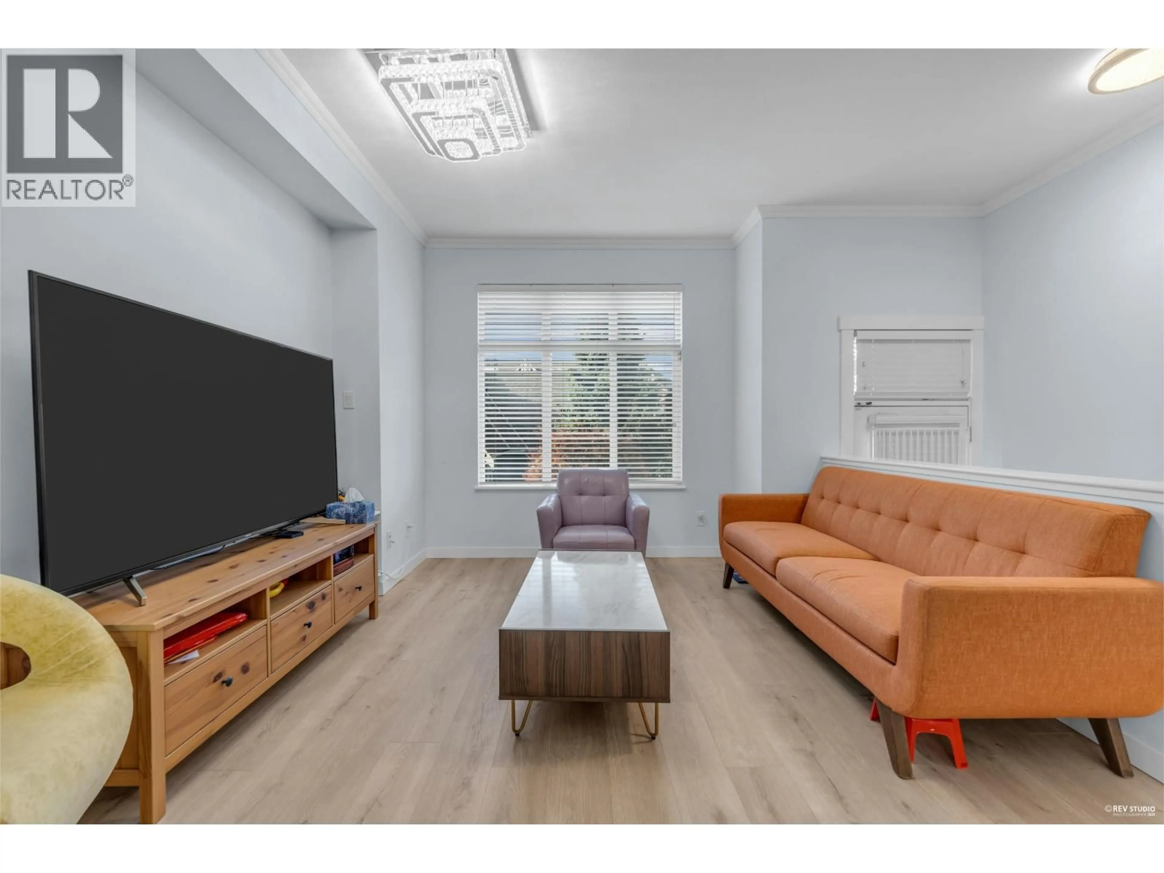 Living room with furniture, wood/laminate floor for 63 - 9800 ODLIN ROAD, Richmond British Columbia V6X0C2