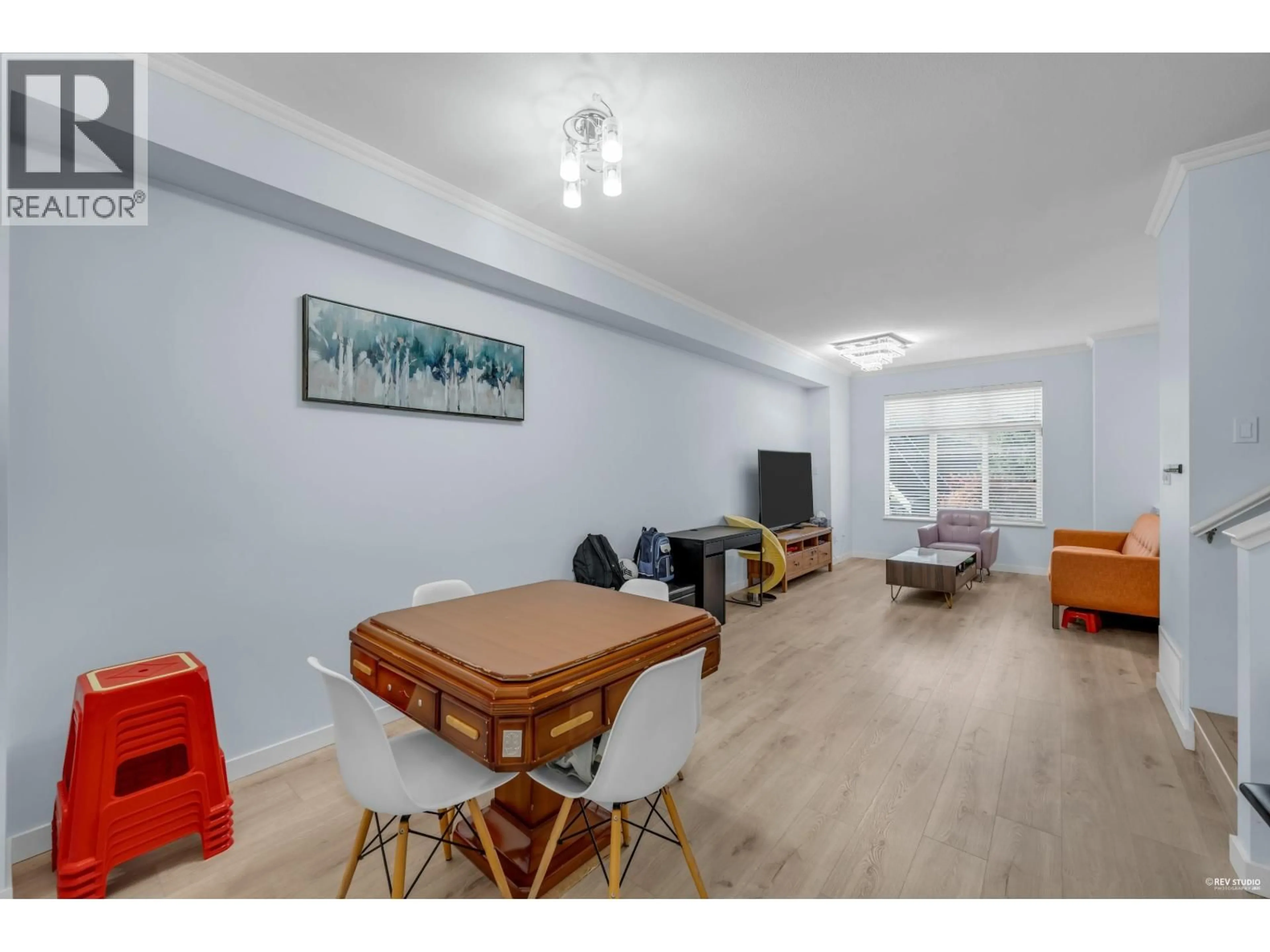 Living room with furniture, wood/laminate floor for 63 - 9800 ODLIN ROAD, Richmond British Columbia V6X0C2