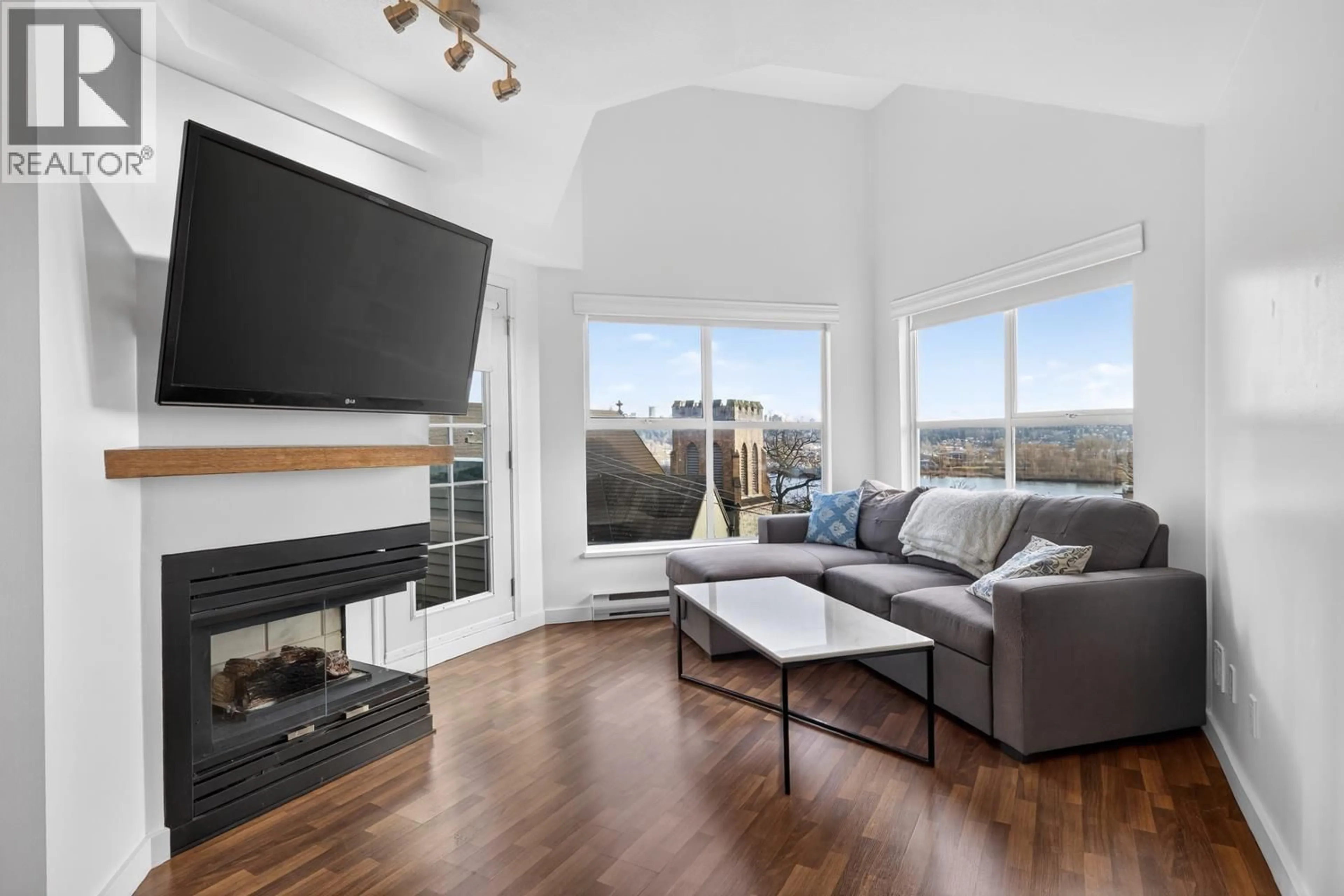 Living room with furniture, wood/laminate floor for 401 - 509 CARNARVON STREET, New Westminster British Columbia V3L5S4