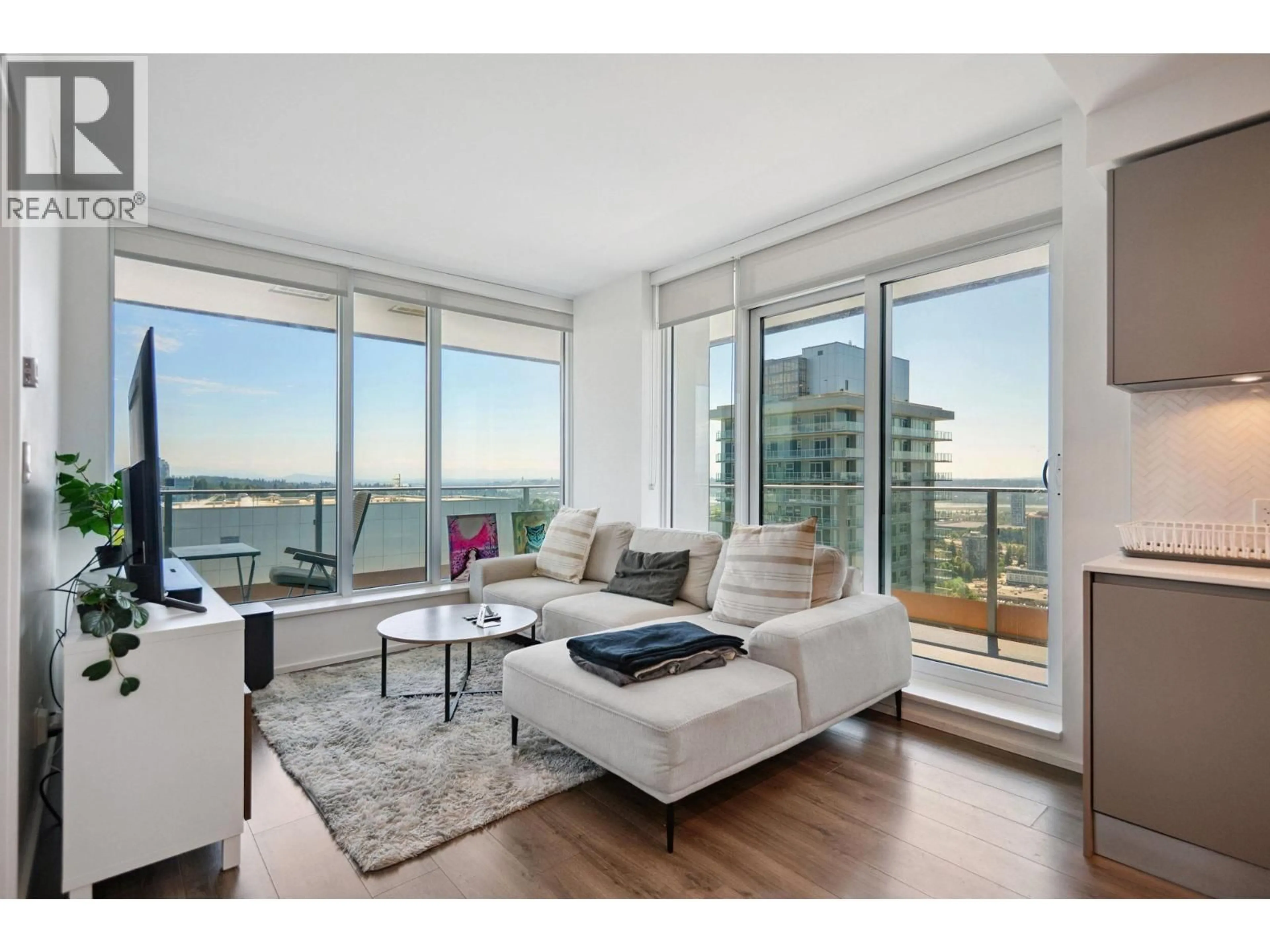 Living room with furniture, wood/laminate floor for 3505 - 3809 EVERGREEN PLACE, Burnaby British Columbia V3J0M1