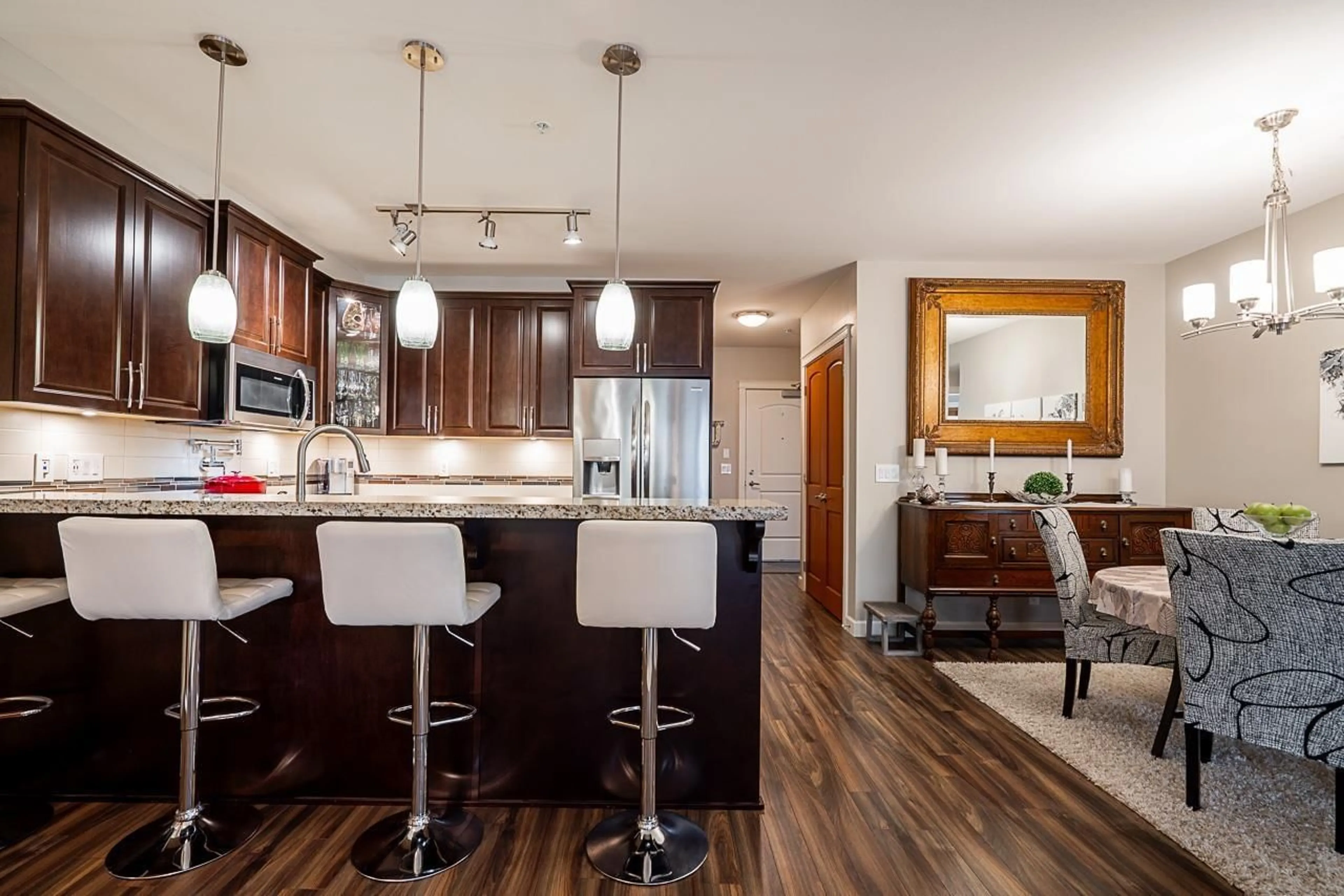Open concept kitchen, wood/laminate floor for B323 - 8218 207A STREET, Langley British Columbia V2Y0Y1