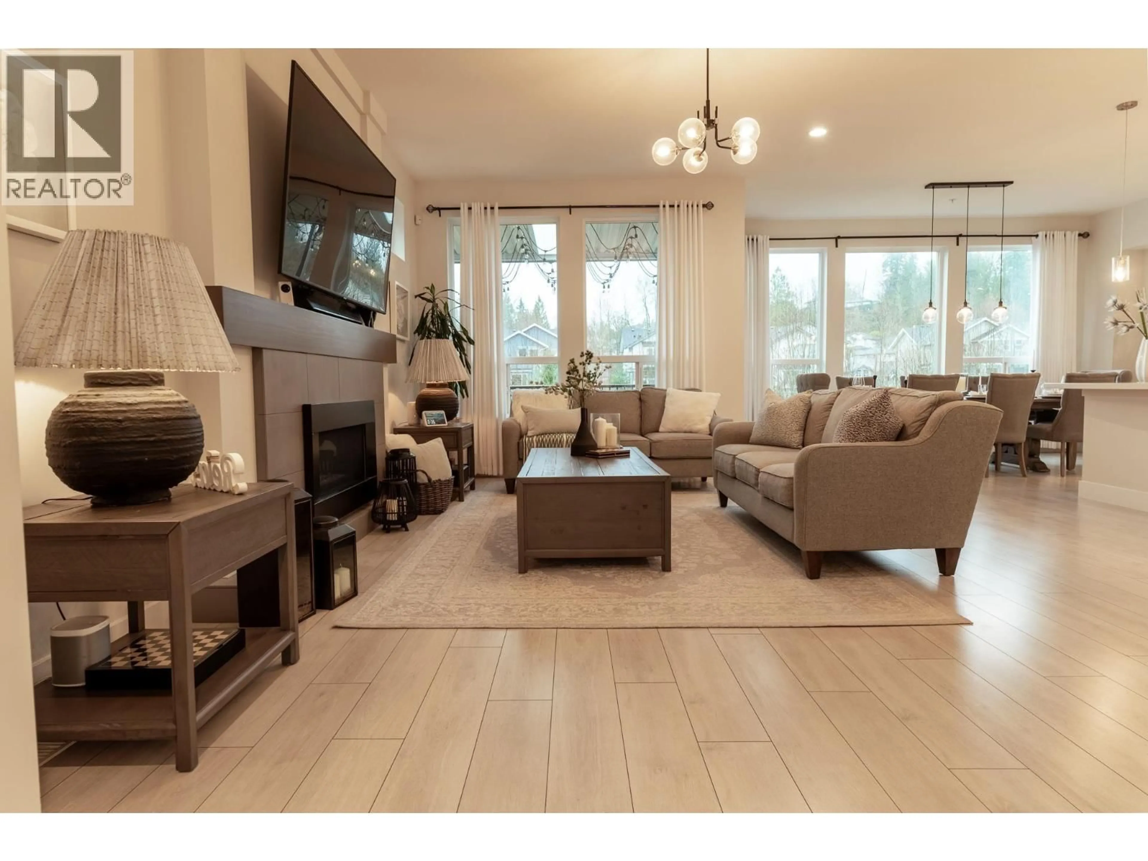 Living room with furniture, wood/laminate floor for 23855 103A, Maple Ridge British Columbia V2W1G3