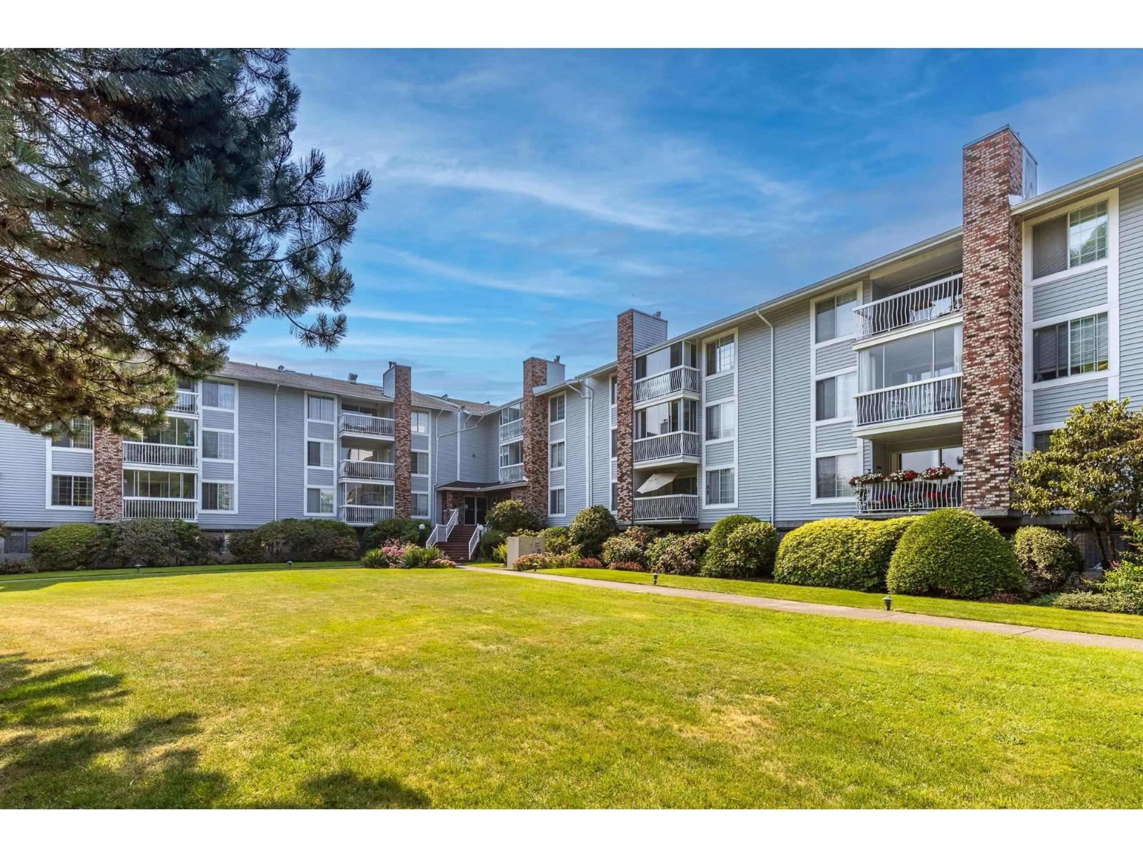 A pic from outside/outdoor area/front of a property/back of a property/a pic from drone, unknown for 221 - 5379 205 STREET, Langley British Columbia V3A7V7