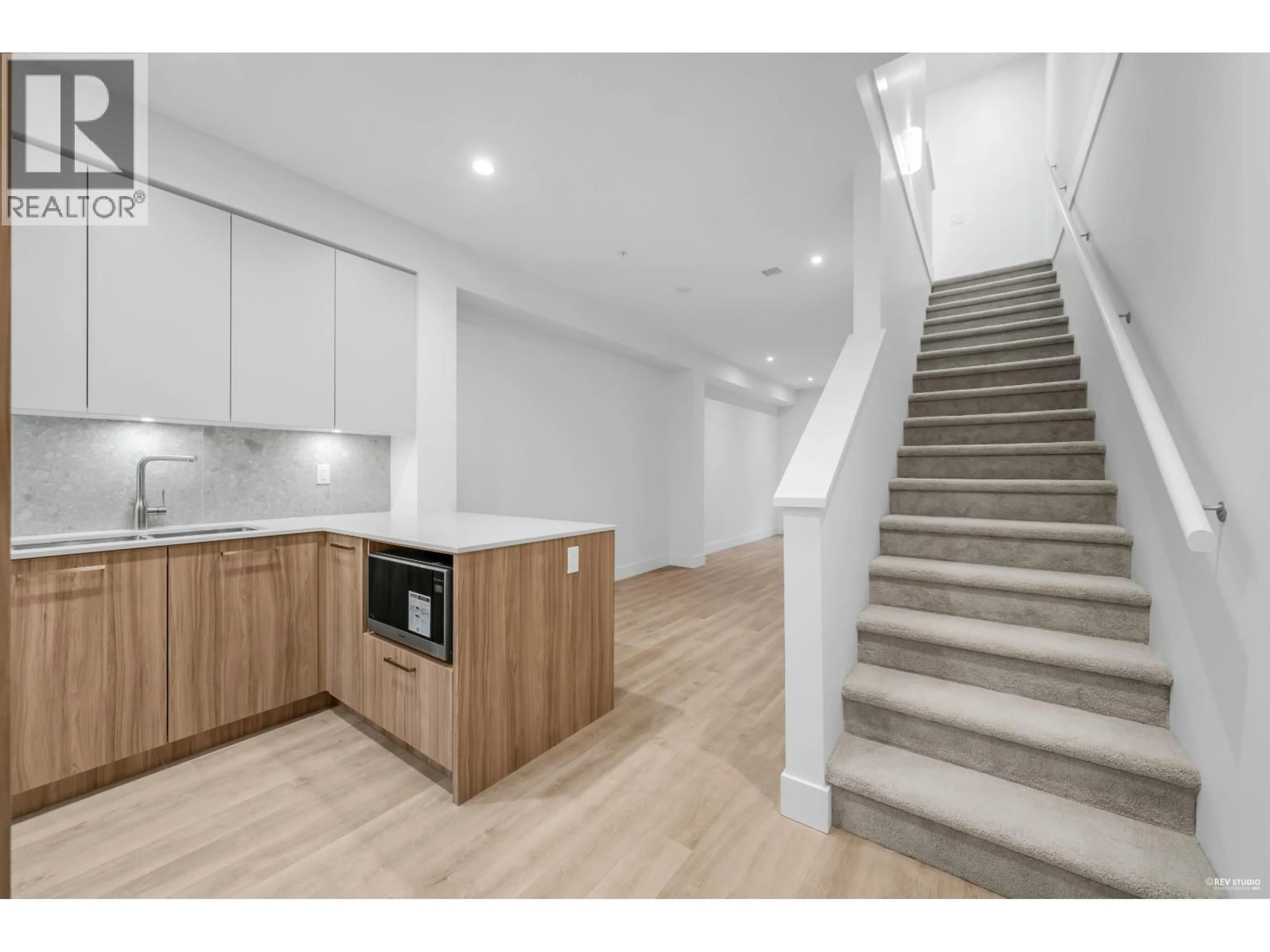 Open concept kitchen, unknown for 105 - 2320 EMERY COURT, North Vancouver British Columbia V7J0G3