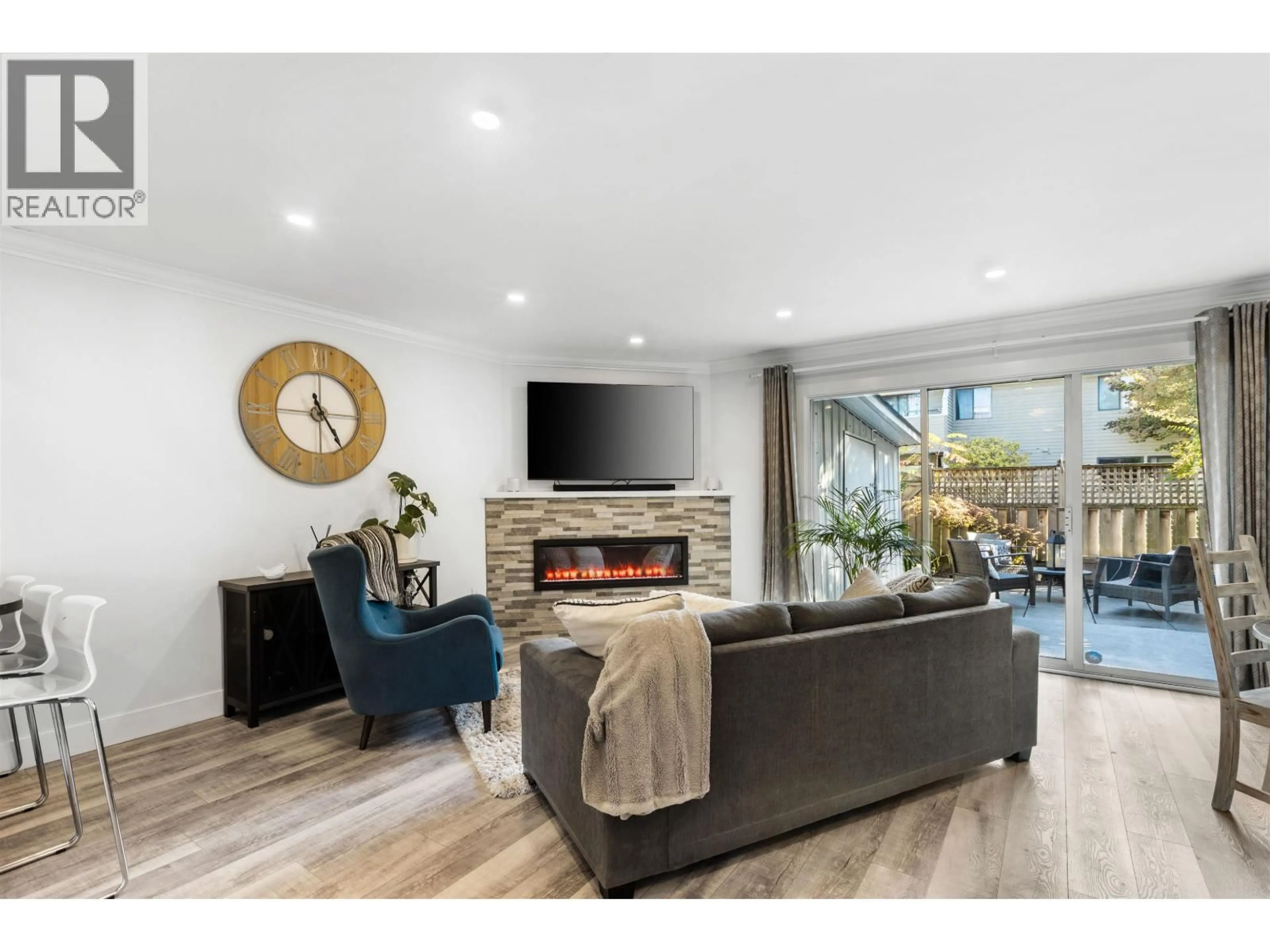 Living room with furniture, wood/laminate floor for 28 - 10840 SPRINGMONT DRIVE, Richmond British Columbia V7E3S5