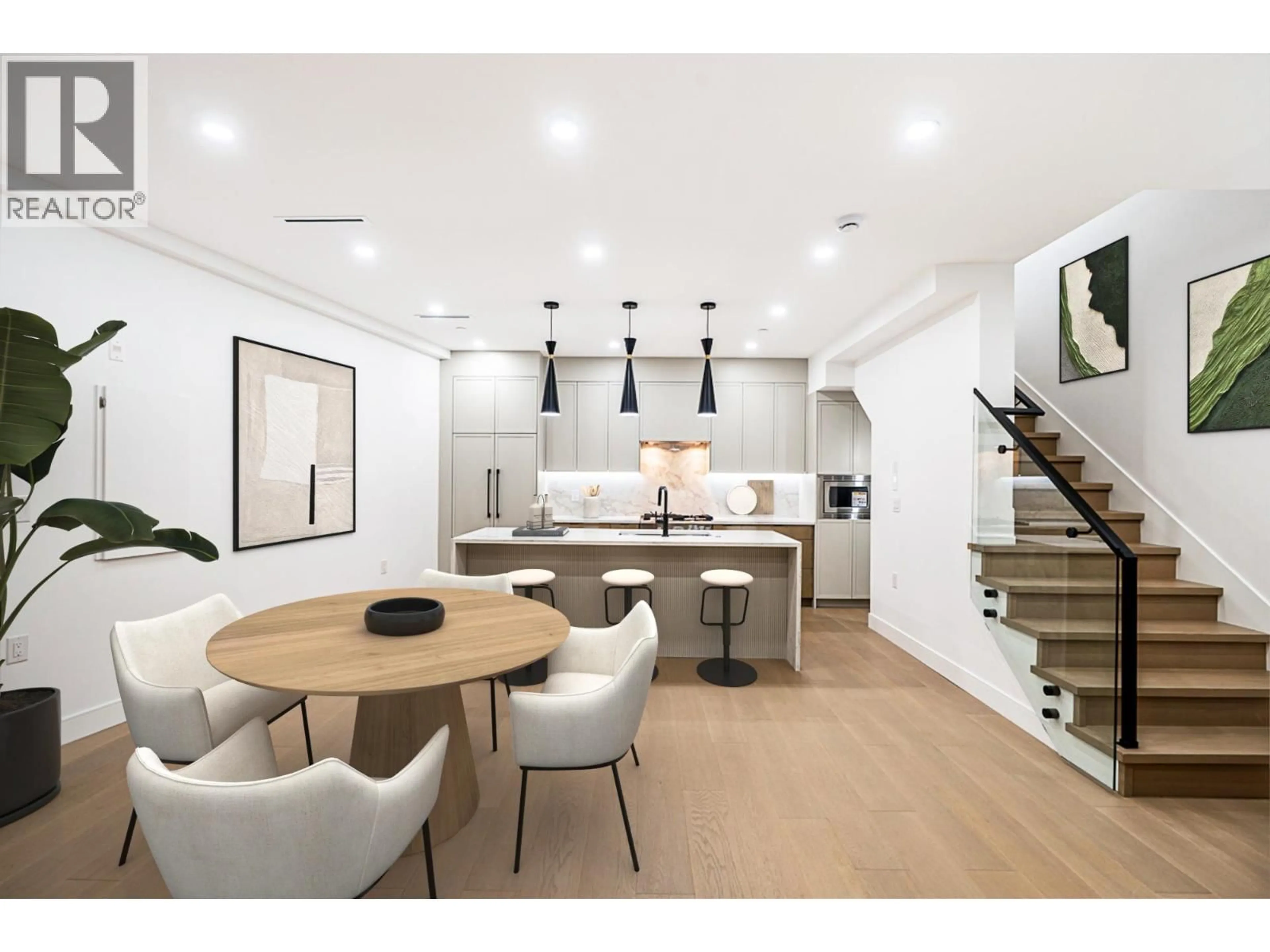 Open concept kitchen, wood/laminate floor for 1 - 2282 8TH AVENUE, Vancouver British Columbia V5N1V5