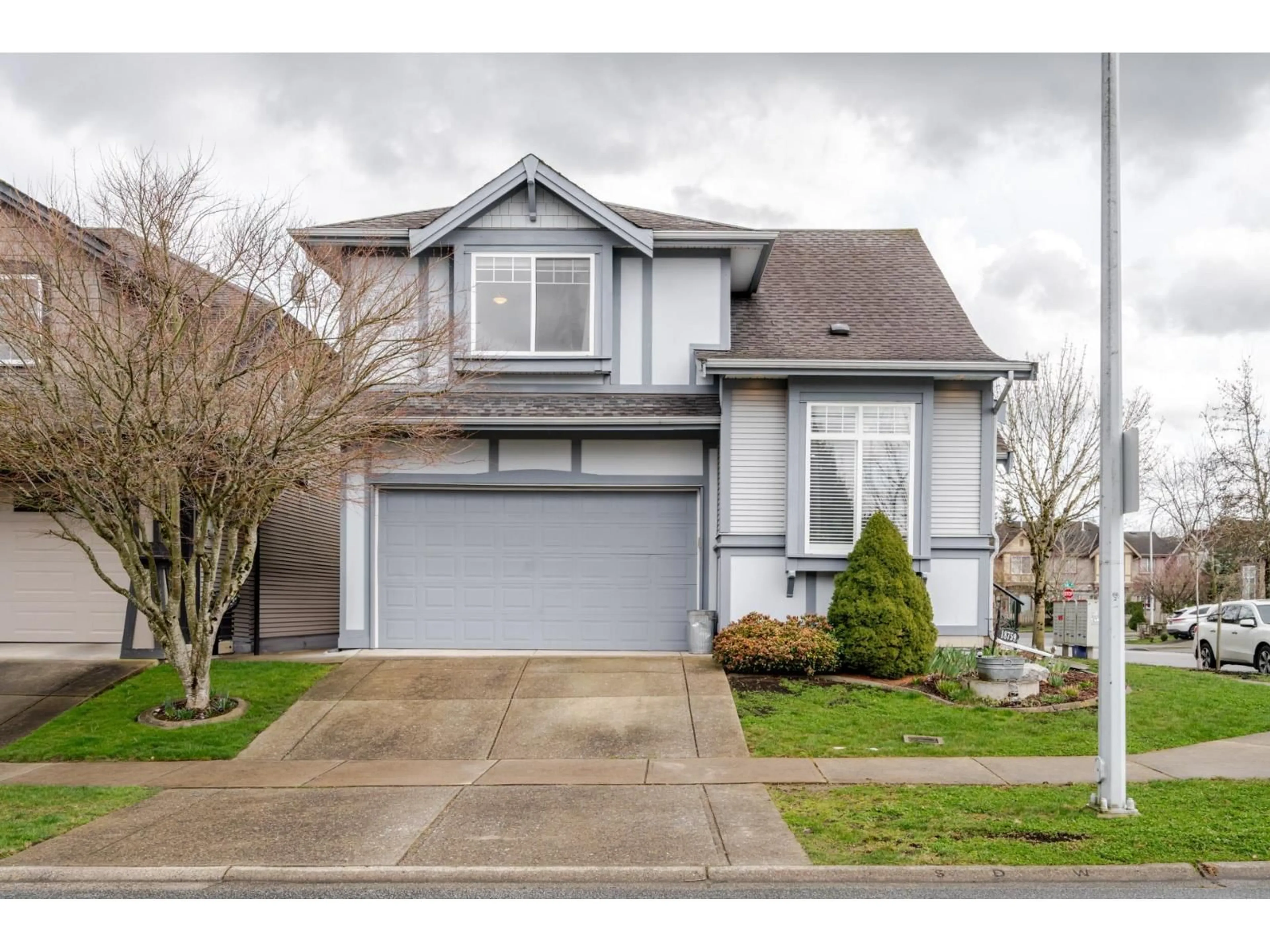 Home with vinyl exterior material, street for 18759 66 AVENUE, Surrey British Columbia V3S0T1