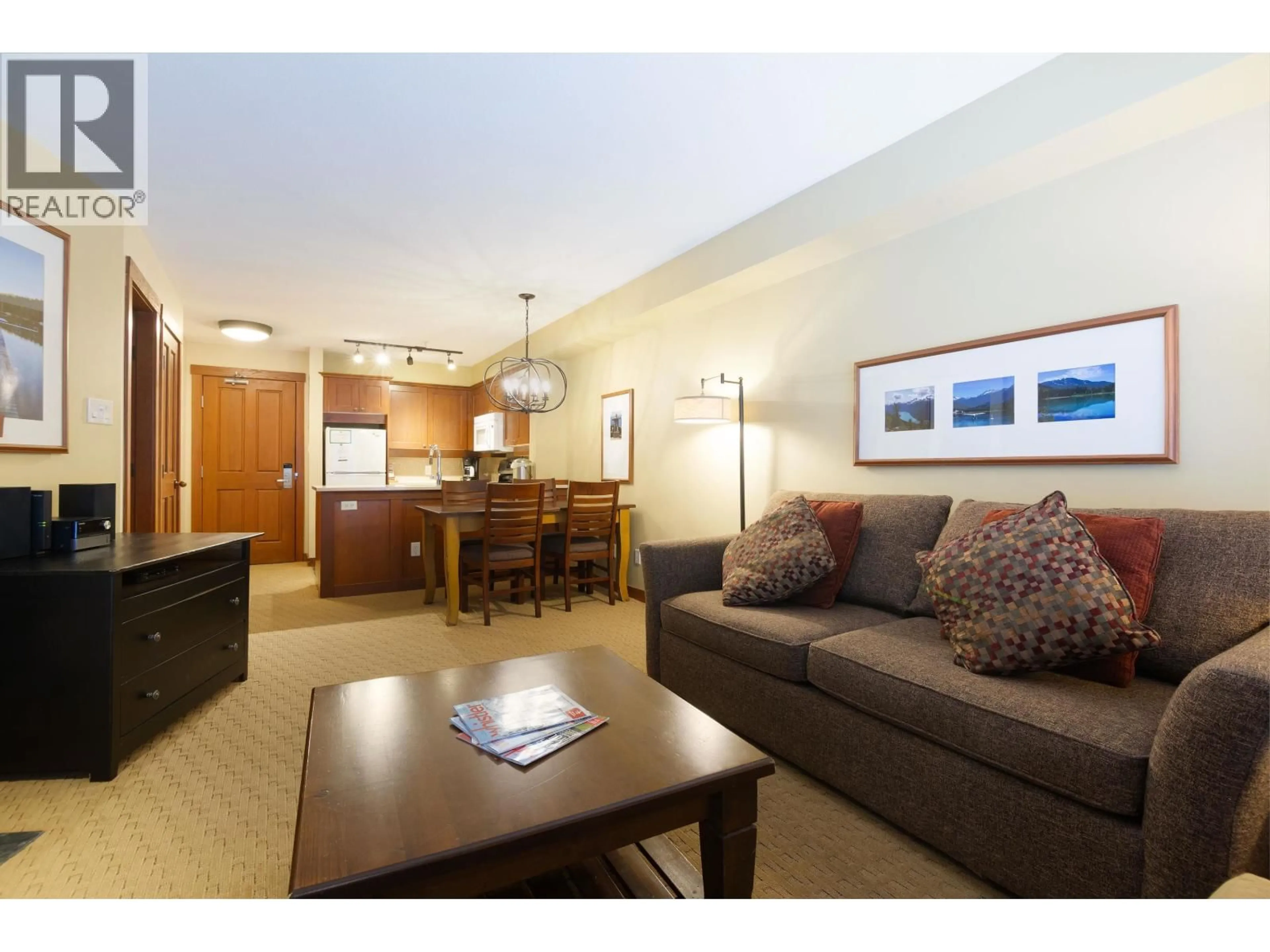 Living room with furniture, wood/laminate floor for 318 G1 - 4653 BLACKCOMB WAY, Whistler British Columbia V8E0Y9