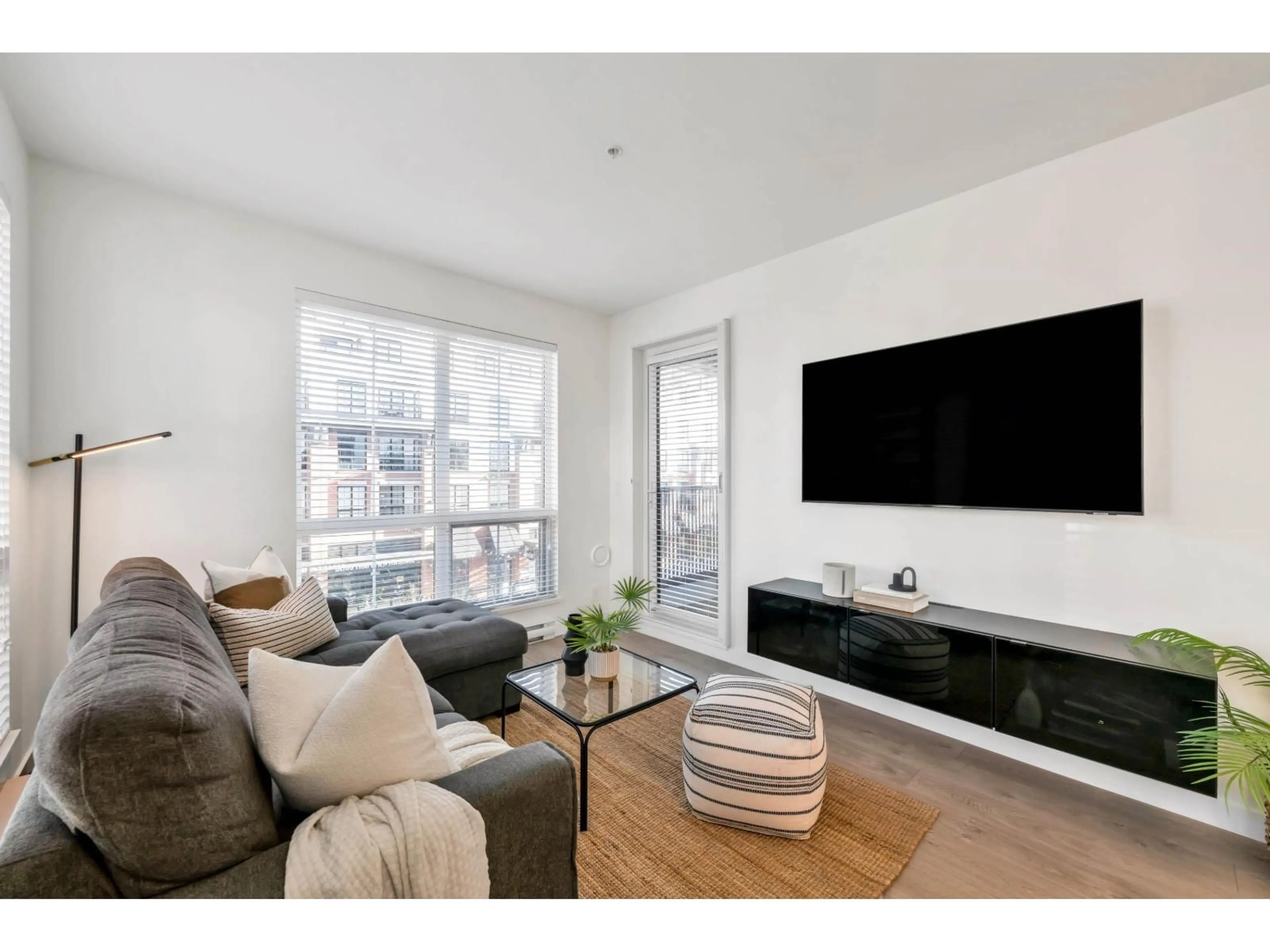 Living room with furniture, wood/laminate floor for A304 - 20018 83A AVENUE, Langley British Columbia V2Y3P2