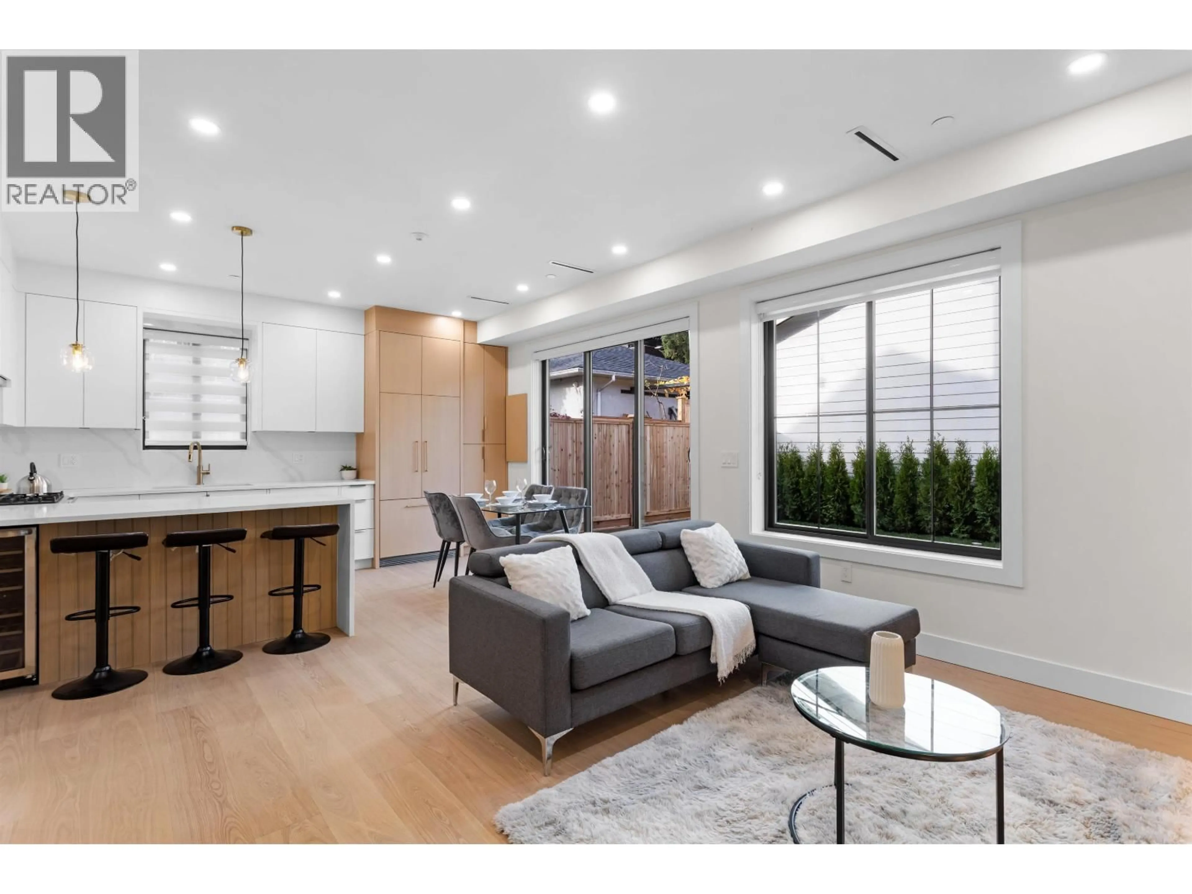 Living room with furniture, wood/laminate floor for 2 - 3429 NAPIER STREET, Vancouver British Columbia V5K2X5
