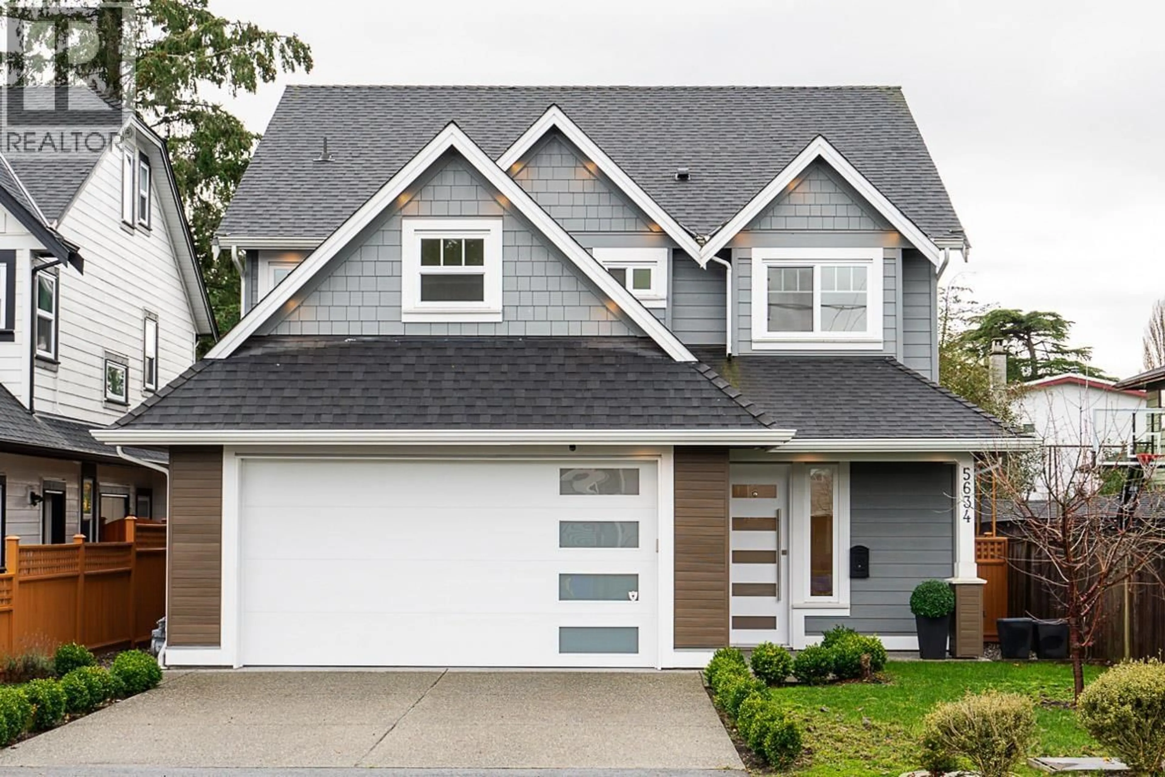 Home with vinyl exterior material, street for 5634 52 AVENUE, Delta British Columbia V4K2C5