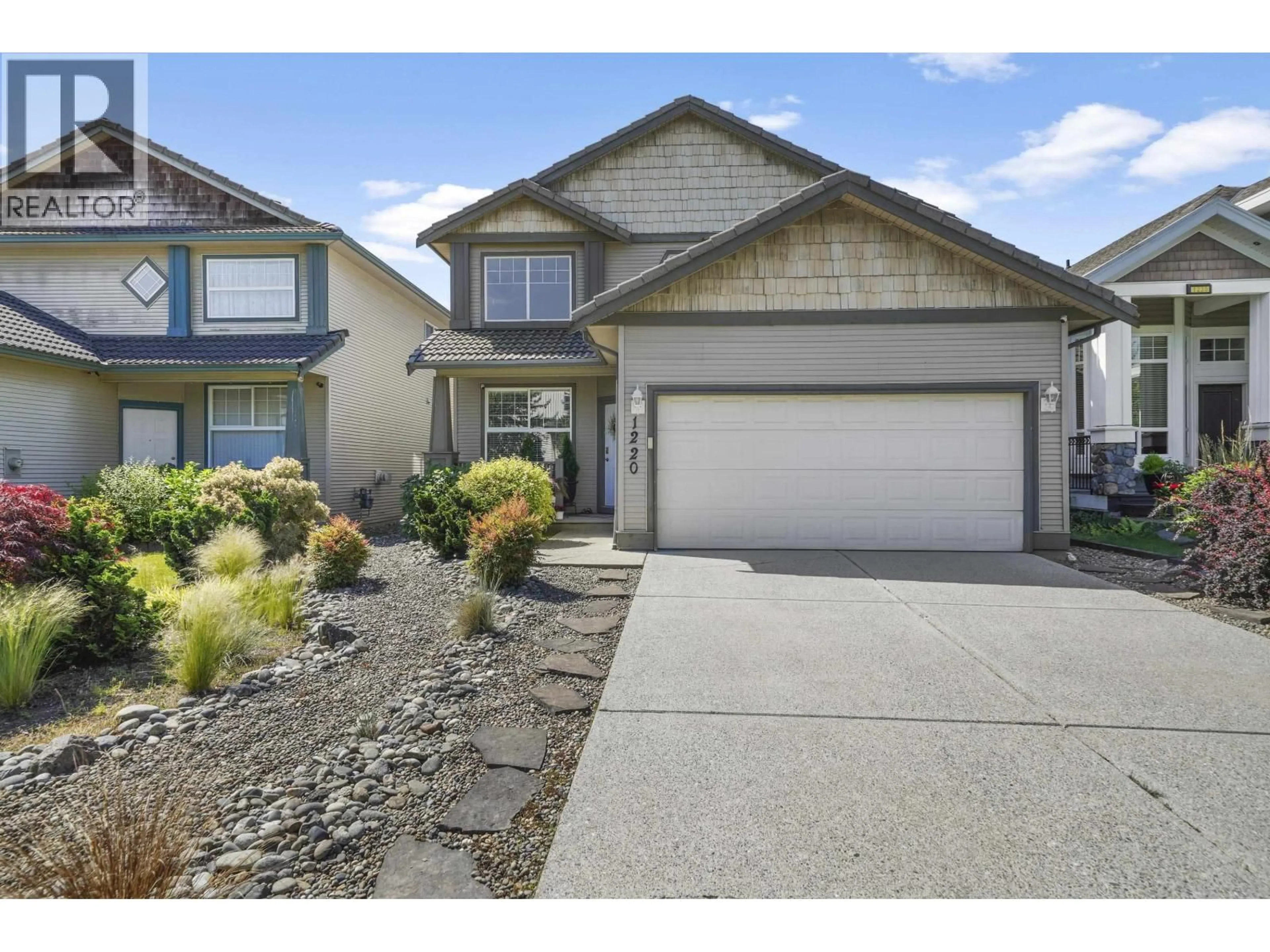 Home with vinyl exterior material, street for 1220 YANGTZE PLACE, Port Coquitlam British Columbia V3B7X1