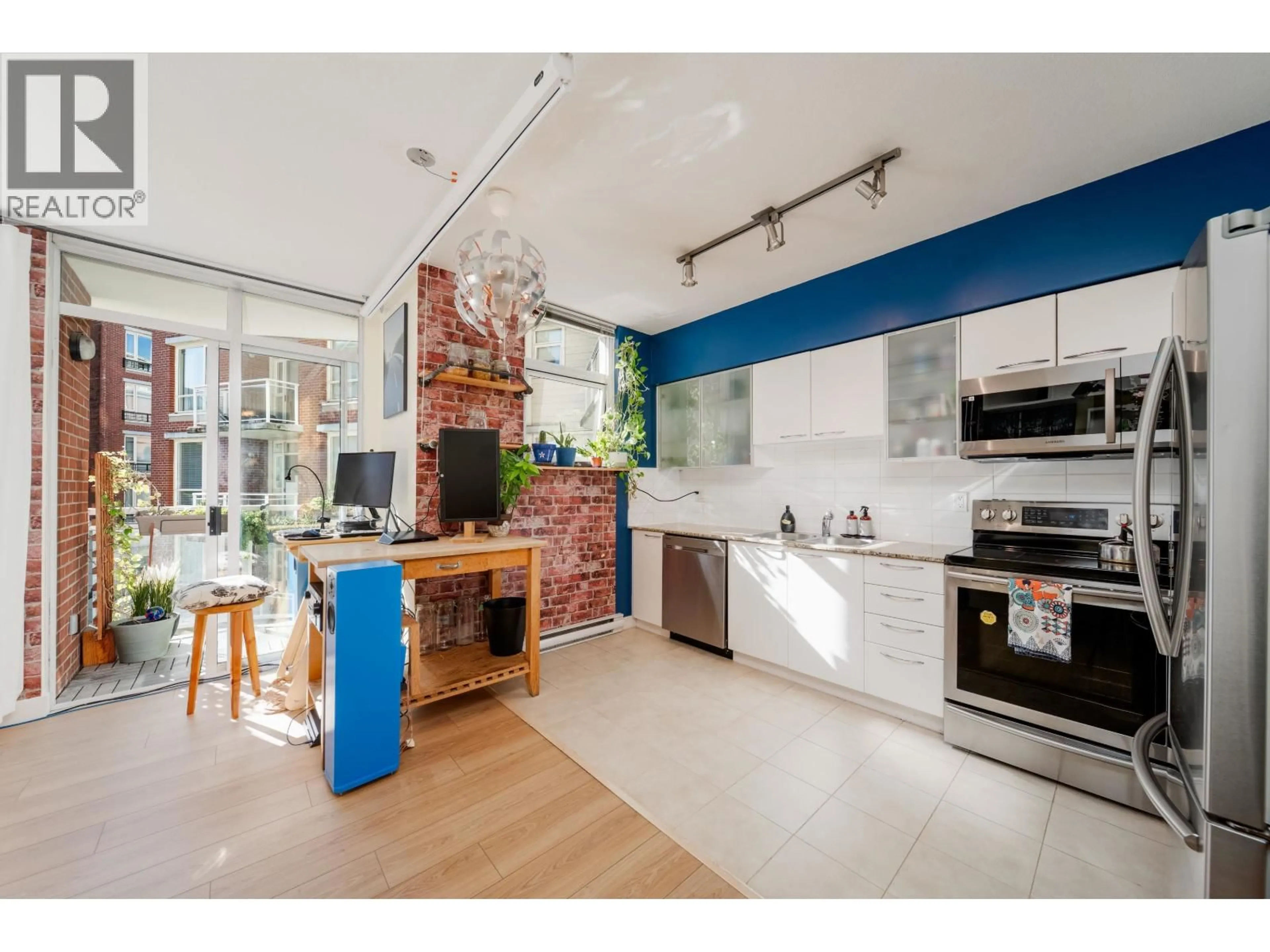 Open concept kitchen, ceramic/tile floor for 420 - 4028 KNIGHT STREET, Vancouver British Columbia V5N5Y8