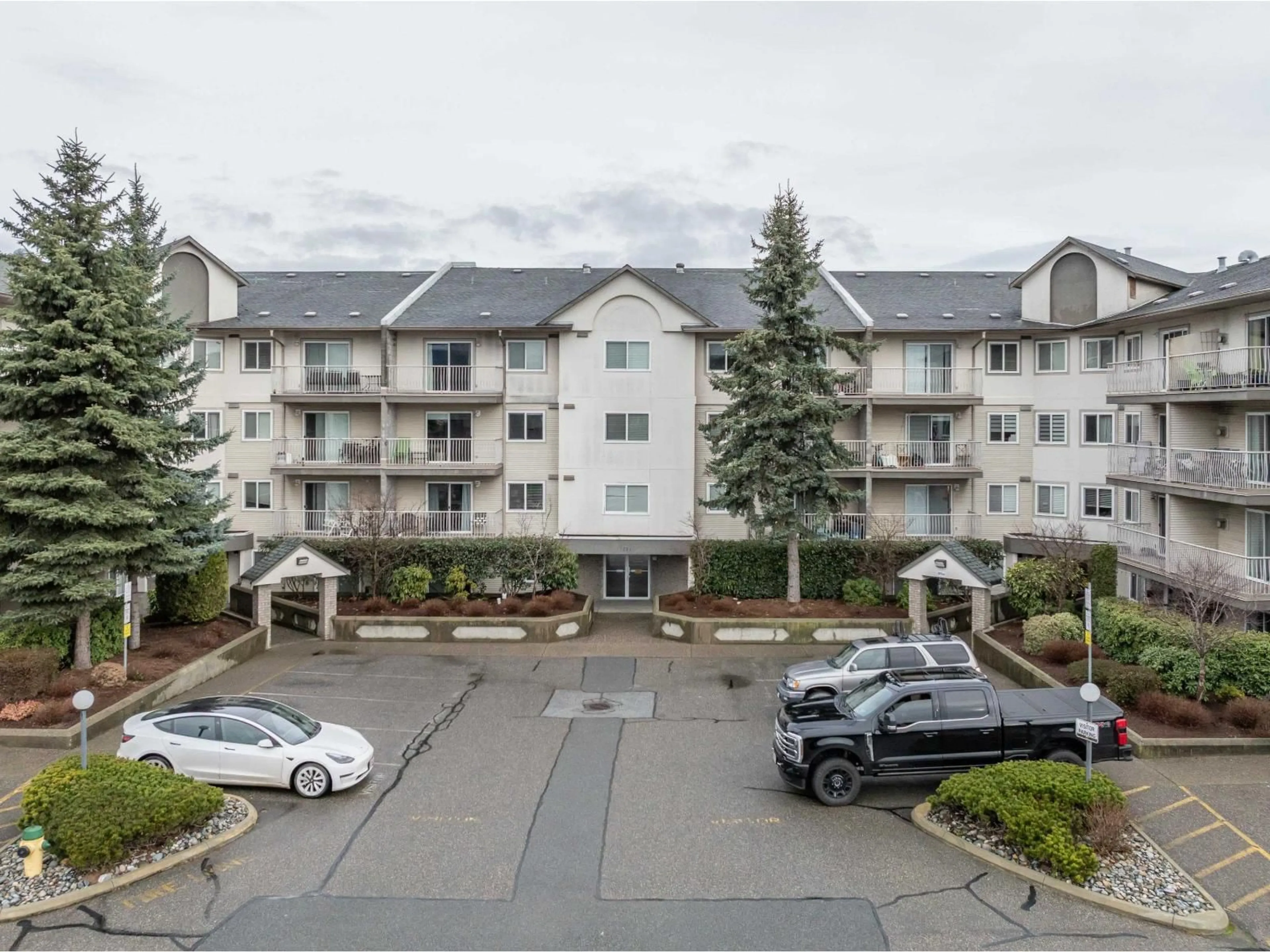 A pic from outside/outdoor area/front of a property/back of a property/a pic from drone, mountain view for 404 - 7694 EVANS ROAD, Chilliwack British Columbia V2R3W3