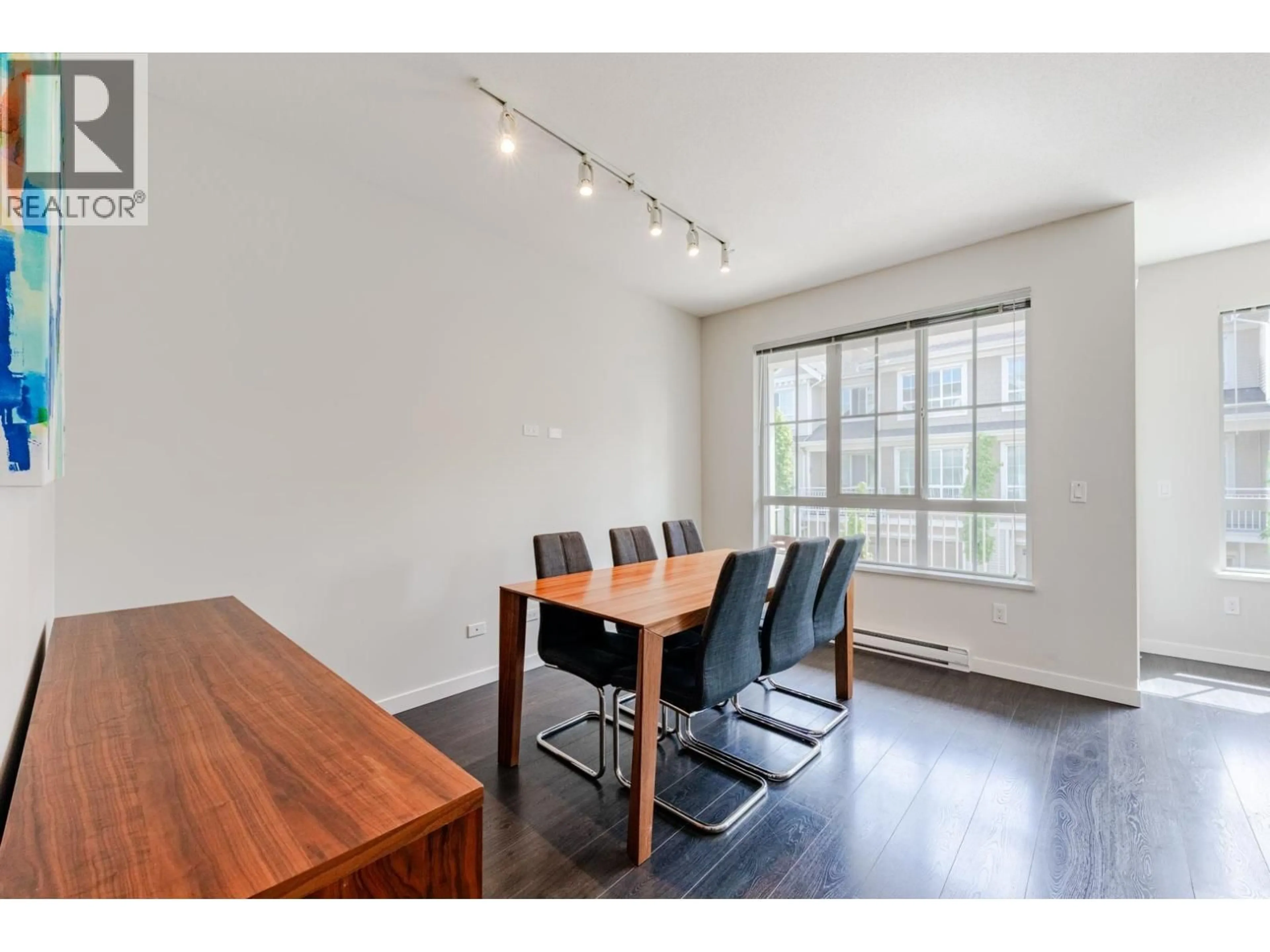 Dining room, wood/laminate floor for 54 - 5510 ADMIRAL WAY, Delta British Columbia V4K0C3