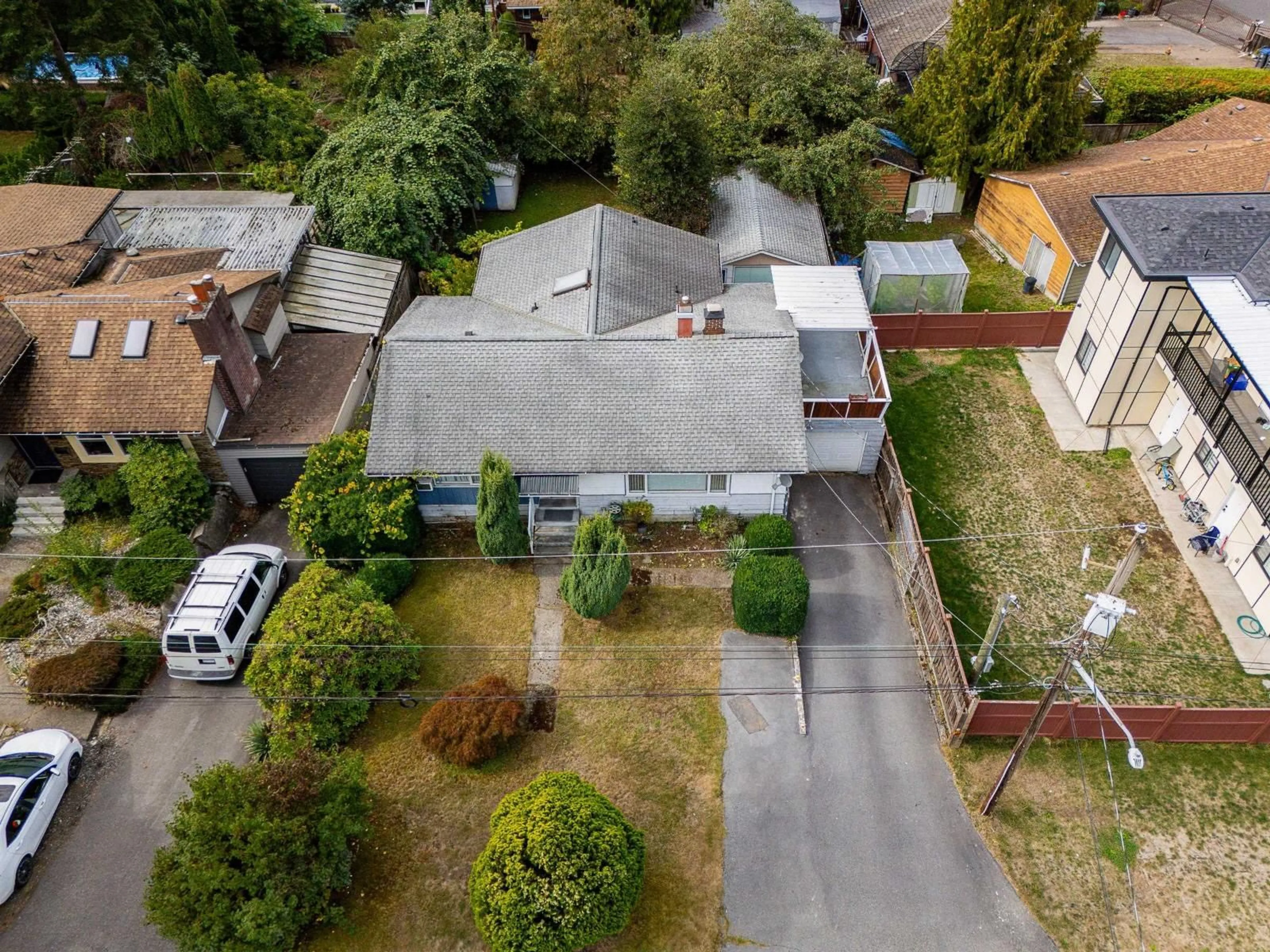 A pic from outside/outdoor area/front of a property/back of a property/a pic from drone, street for 10725 127A STREET, Surrey British Columbia V3V5L7