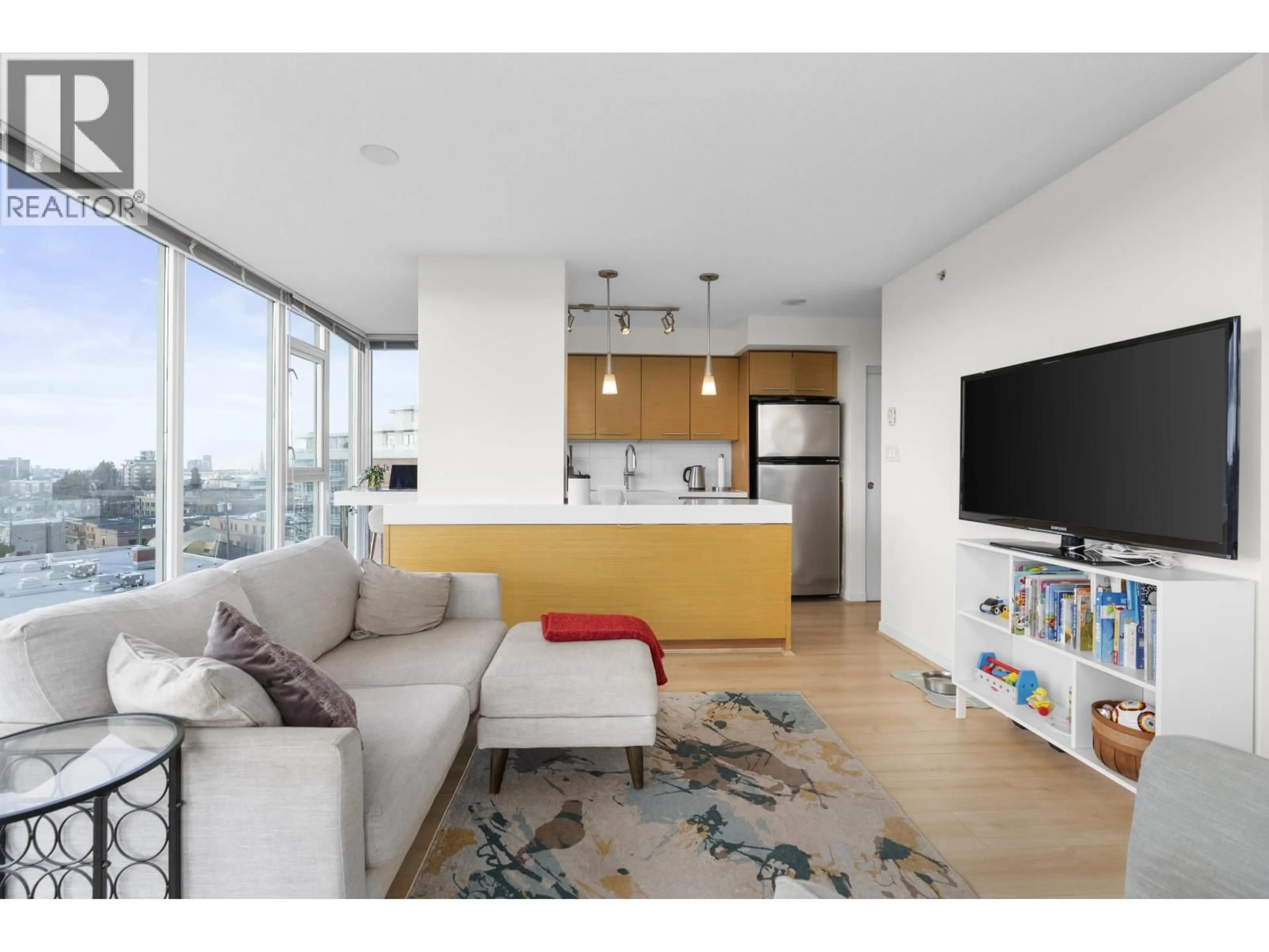 Living room with furniture, unknown for 709 - 2770 SOPHIA STREET, Vancouver British Columbia V5T0A4