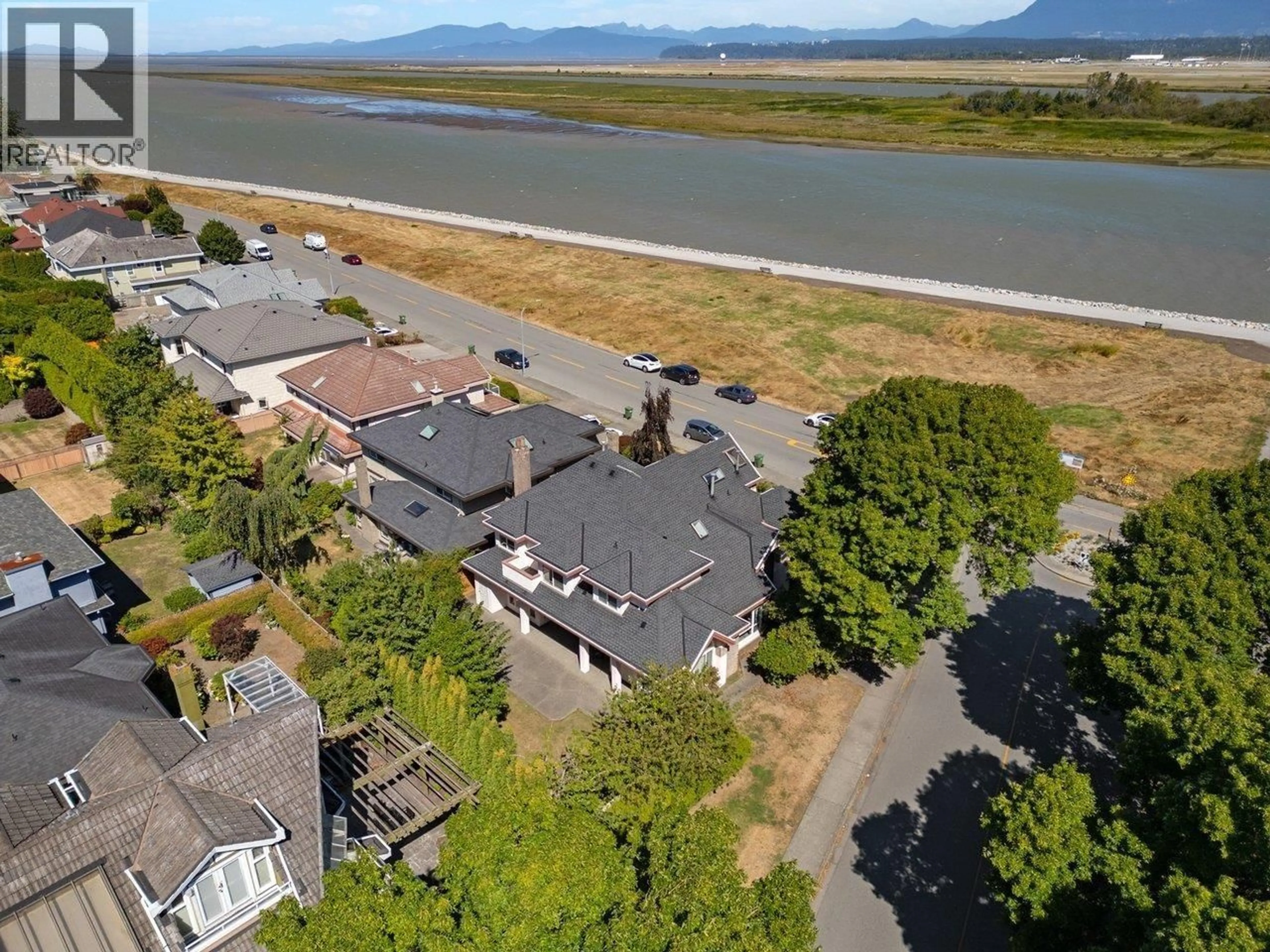 A pic from outside/outdoor area/front of a property/back of a property/a pic from drone, water/lake/river/ocean view for 3340 RIVER ROAD, Richmond British Columbia V7C5N2