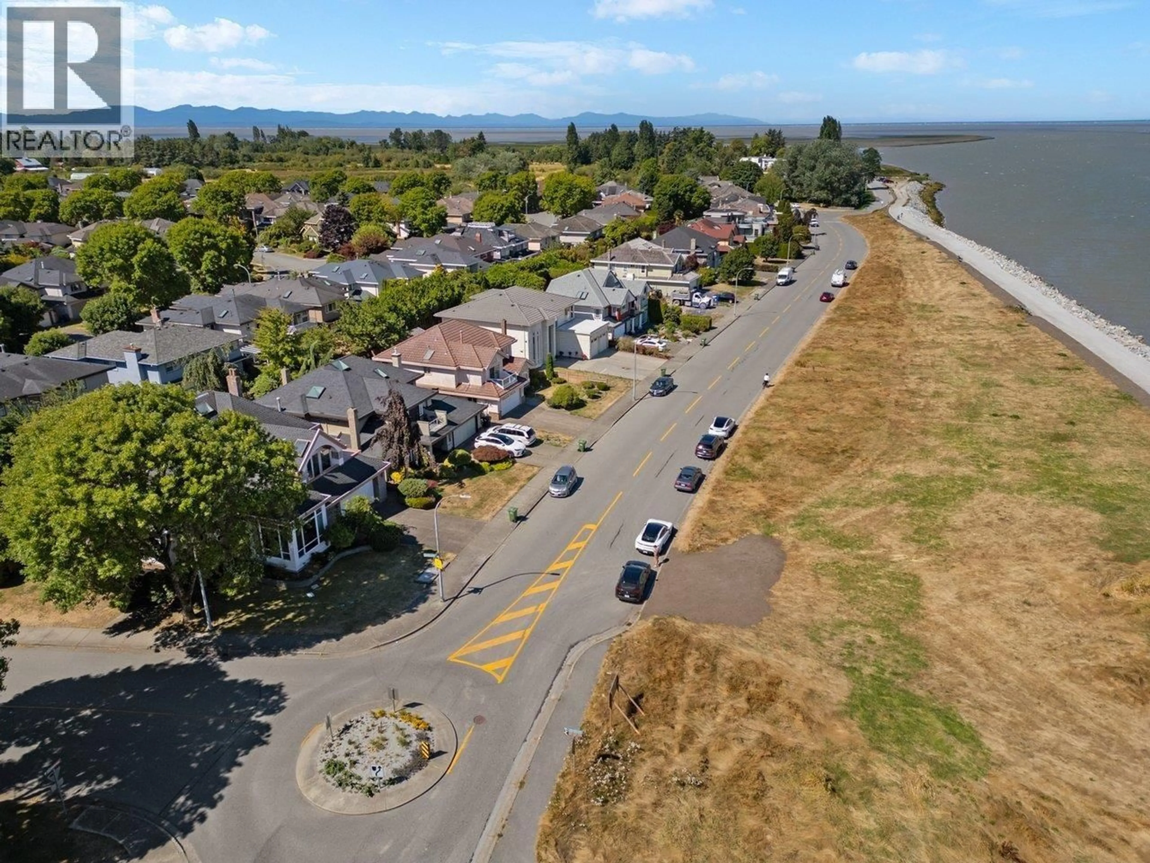 A pic from outside/outdoor area/front of a property/back of a property/a pic from drone, water/lake/river/ocean view for 3340 RIVER ROAD, Richmond British Columbia V7C5N2