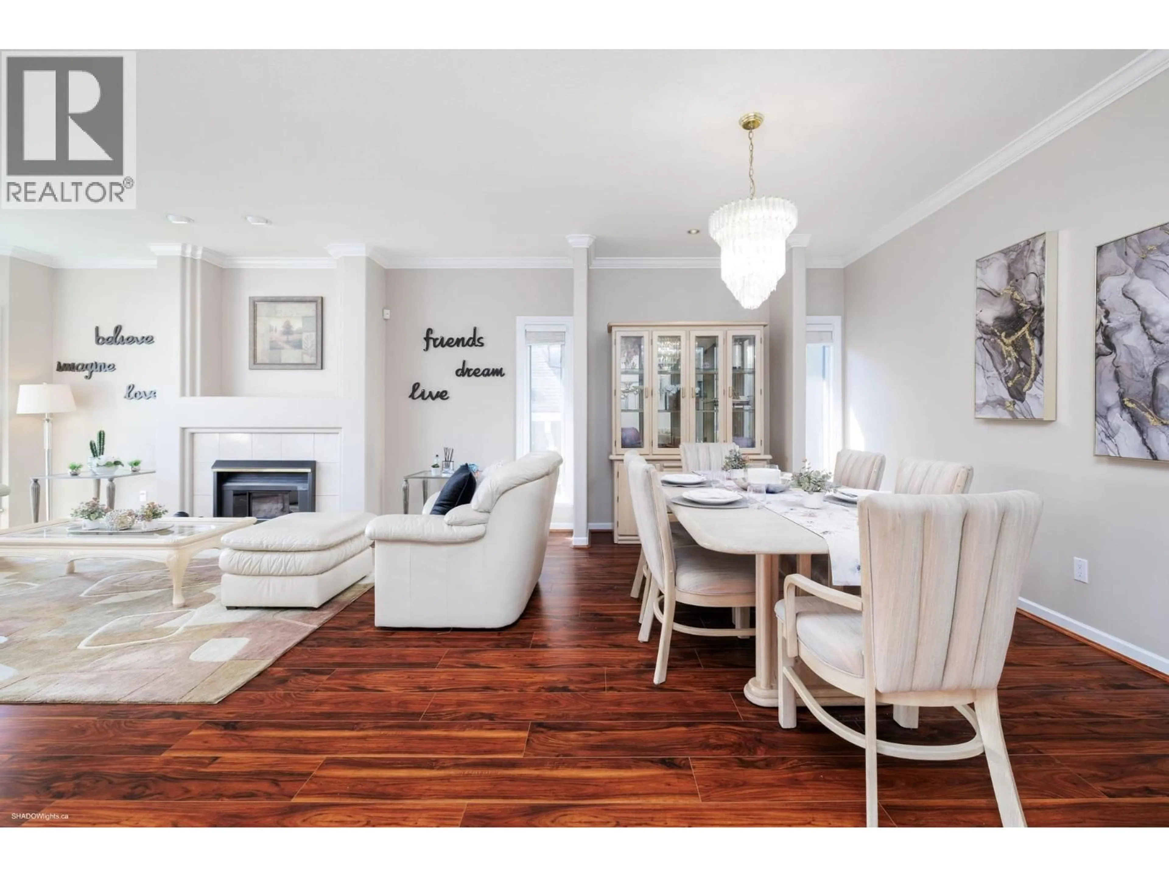 Living room with furniture, wood/laminate floor for 5411 MCCOLL CRESCENT, Richmond British Columbia V6V2L6