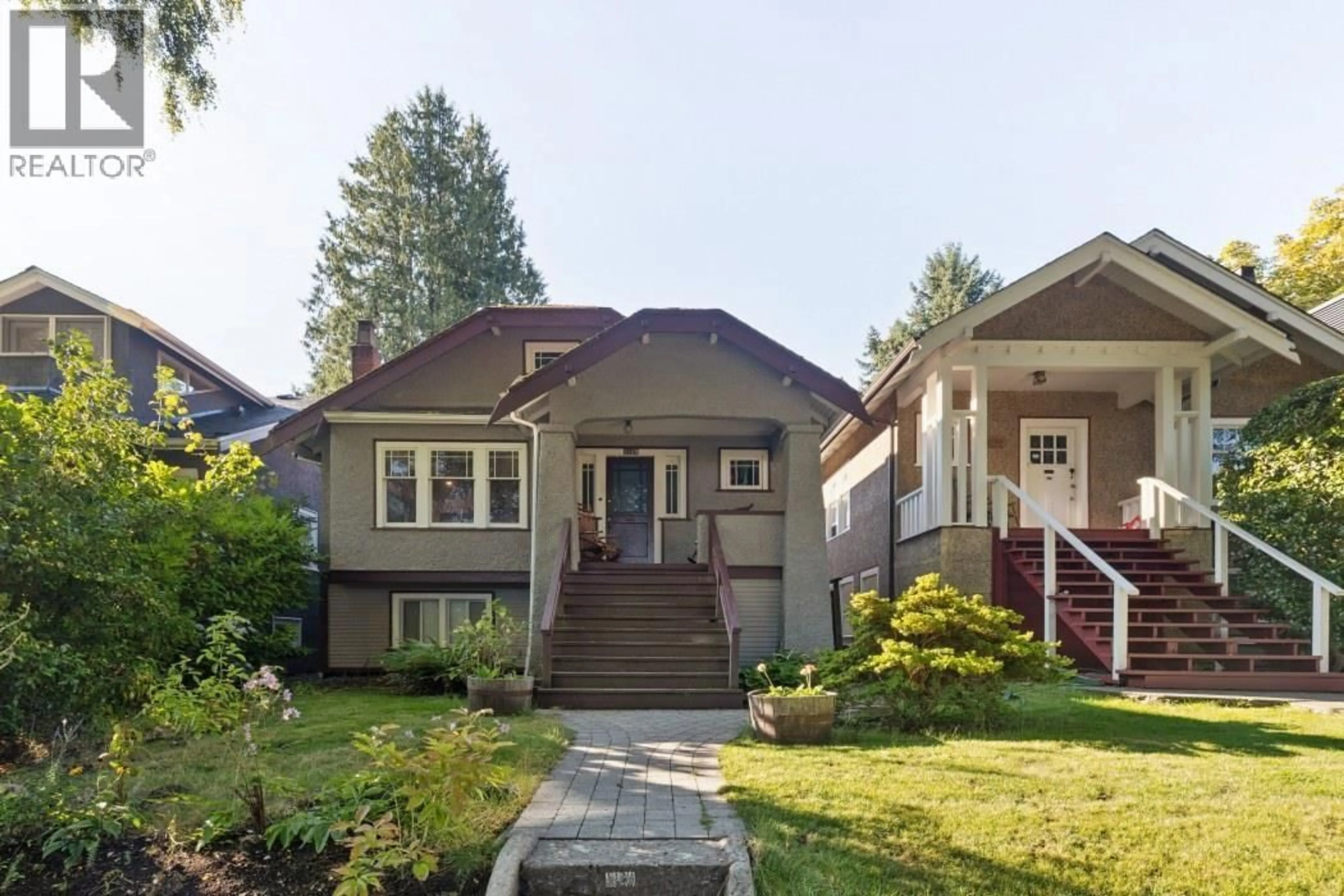 Home with vinyl exterior material, street for 4188 13TH AVENUE, Vancouver British Columbia V6R2T6