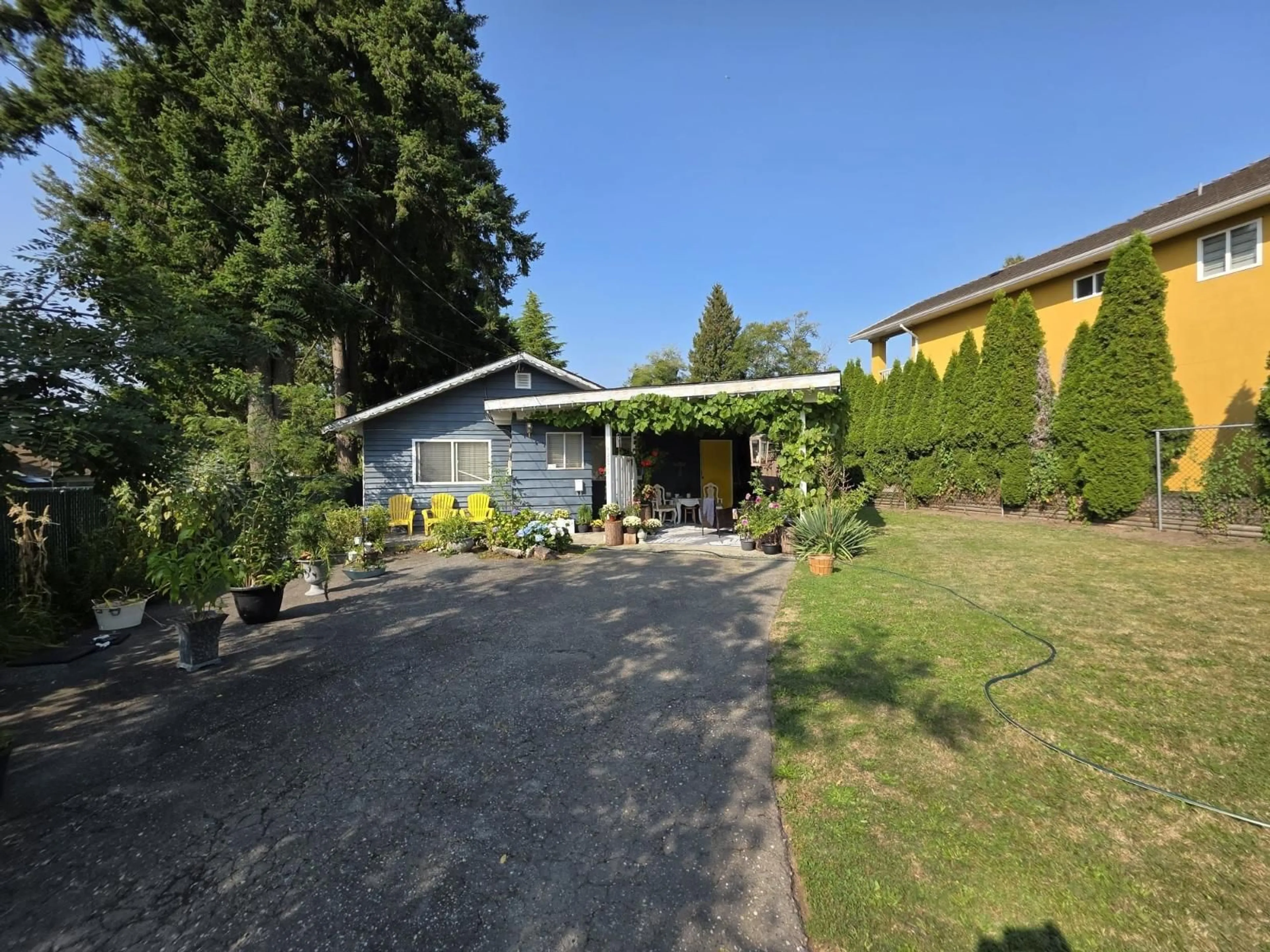 A pic from outside/outdoor area/front of a property/back of a property/a pic from drone, street for 13075 OLD YALE ROAD, Surrey British Columbia V3T3C3