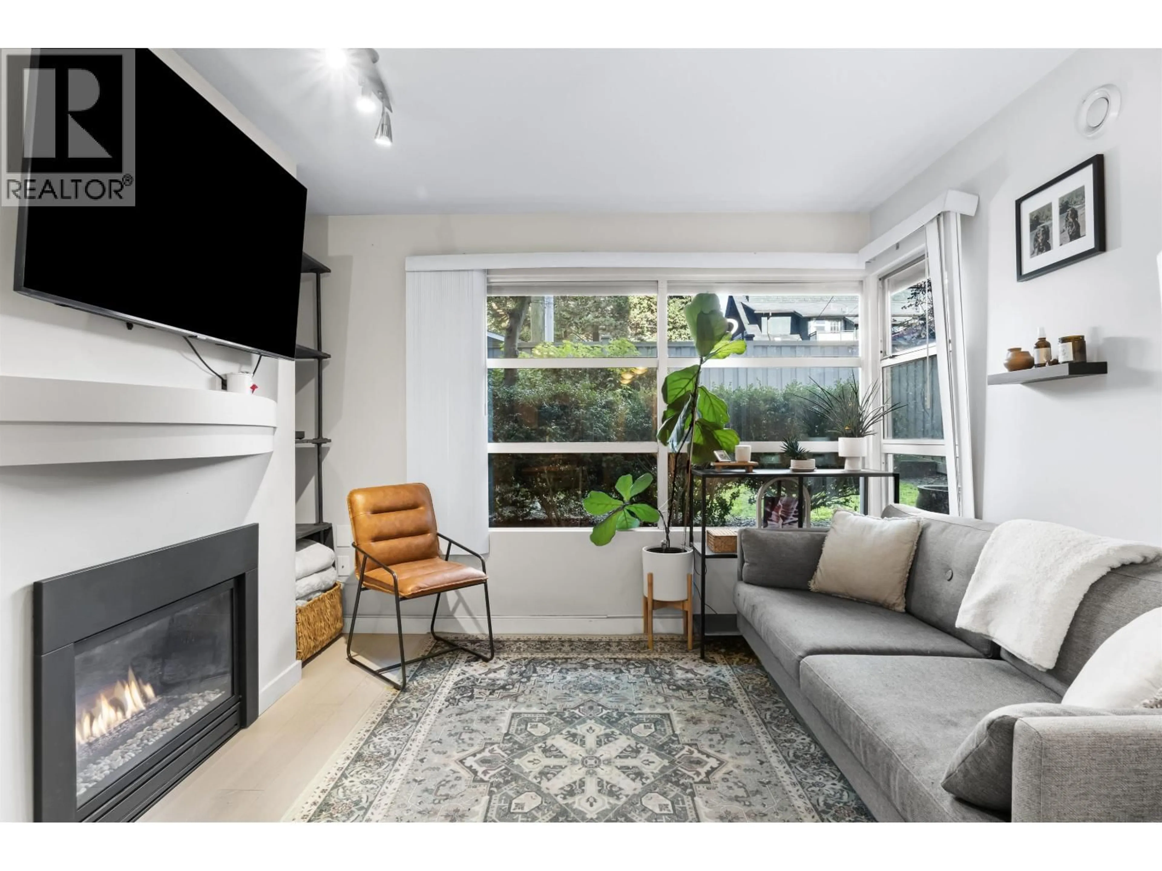 Living room with furniture, unknown for 101 - 3023 4TH AVENUE, Vancouver British Columbia V6K1R5