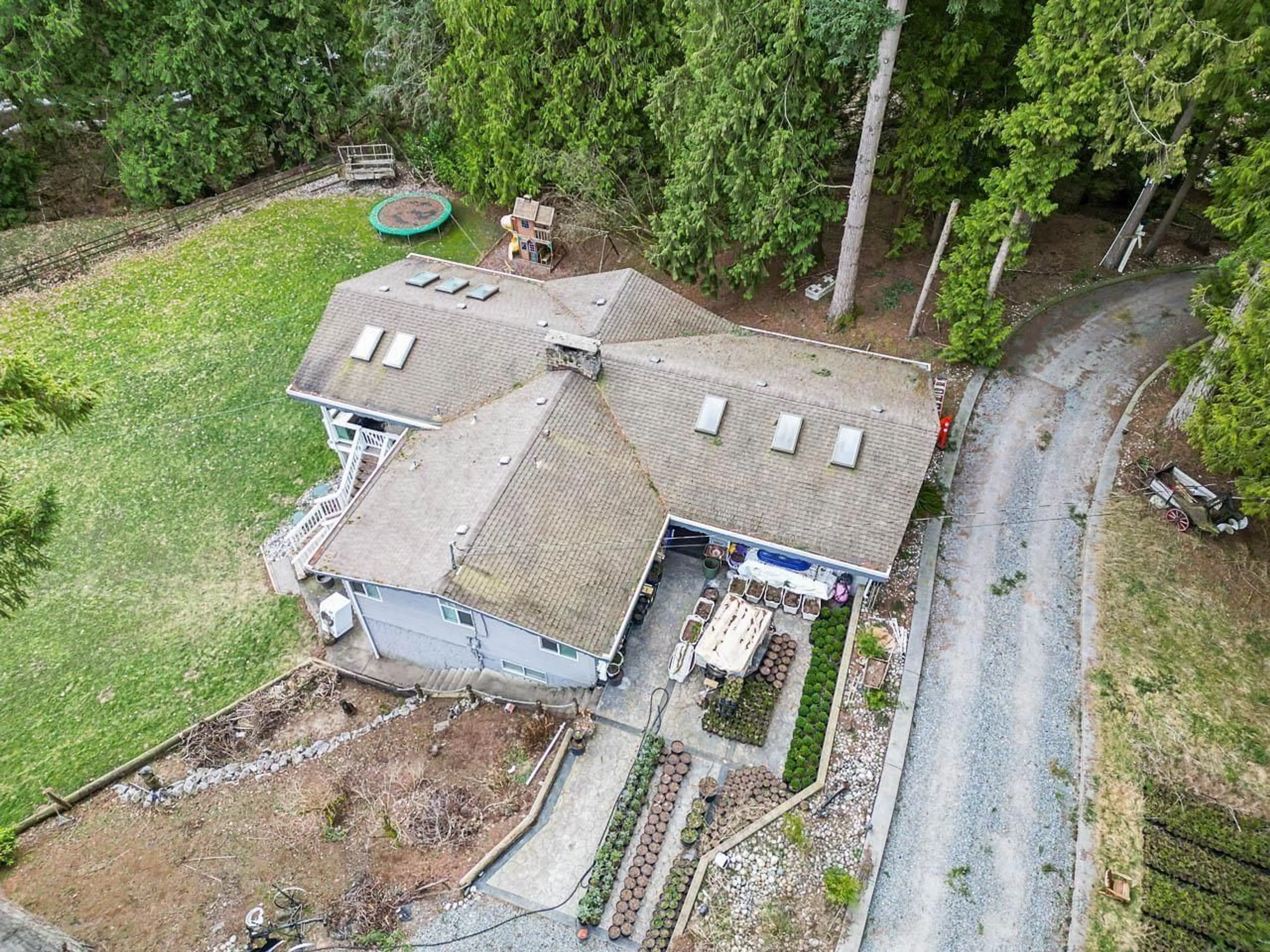 A pic from outside/outdoor area/front of a property/back of a property/a pic from drone, building for 3870 216 STREET, Langley British Columbia V3A8P2