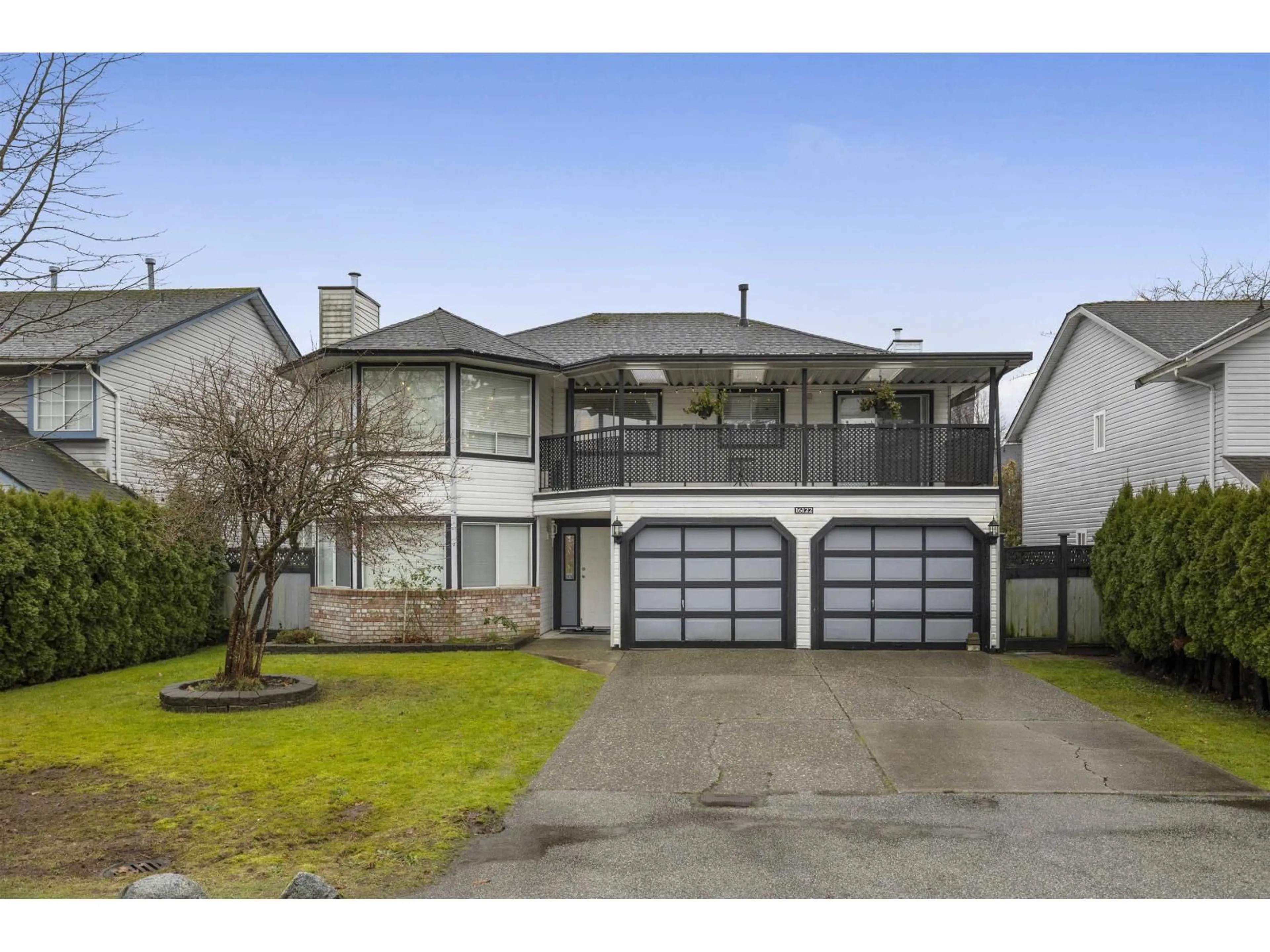 Home with vinyl exterior material, street for 16122 92 AVENUE, Surrey British Columbia V4N3C4